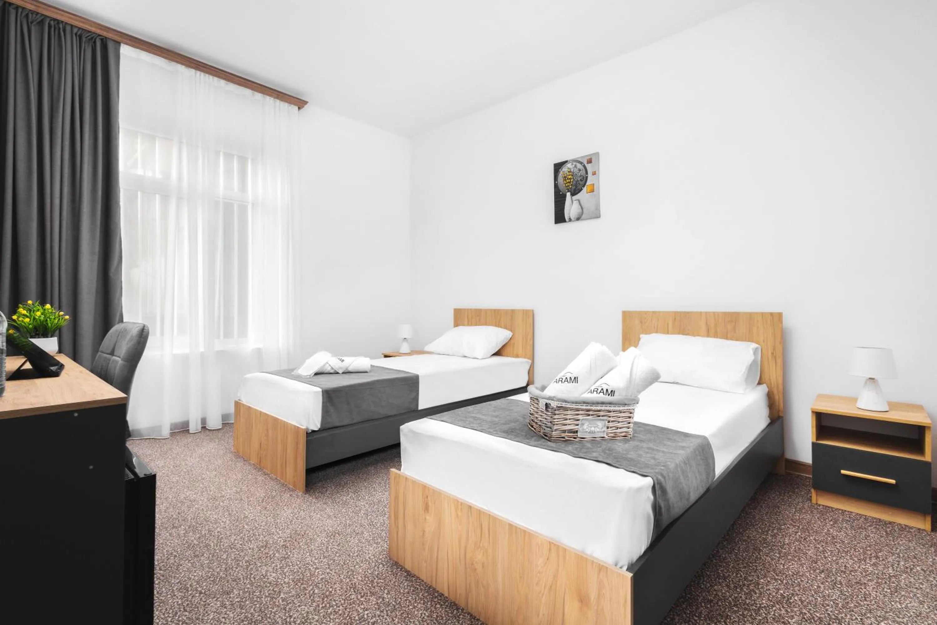 Bed in Hotel Arami by Downtown