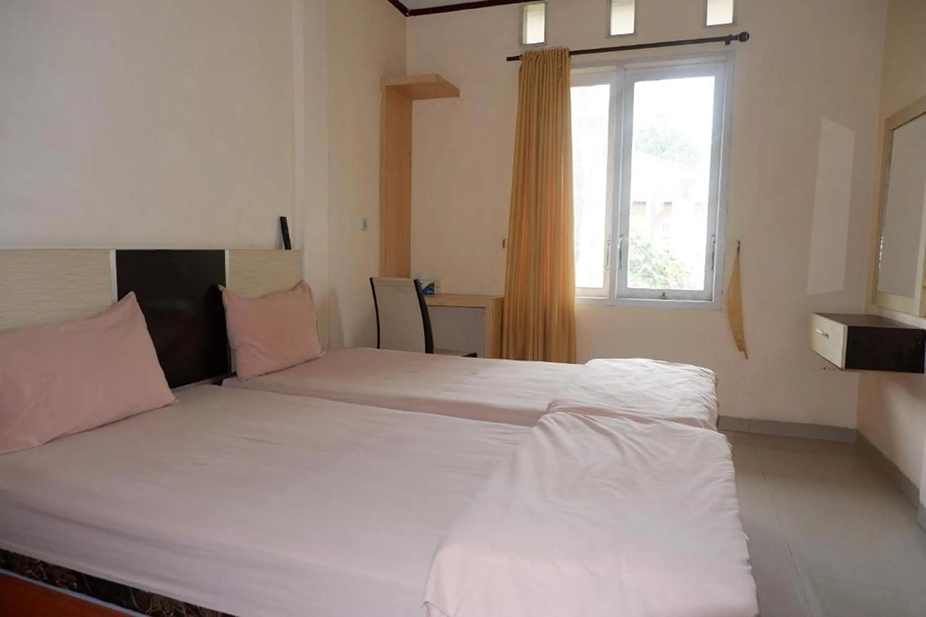 Bed in Hotel Manggasa Makale