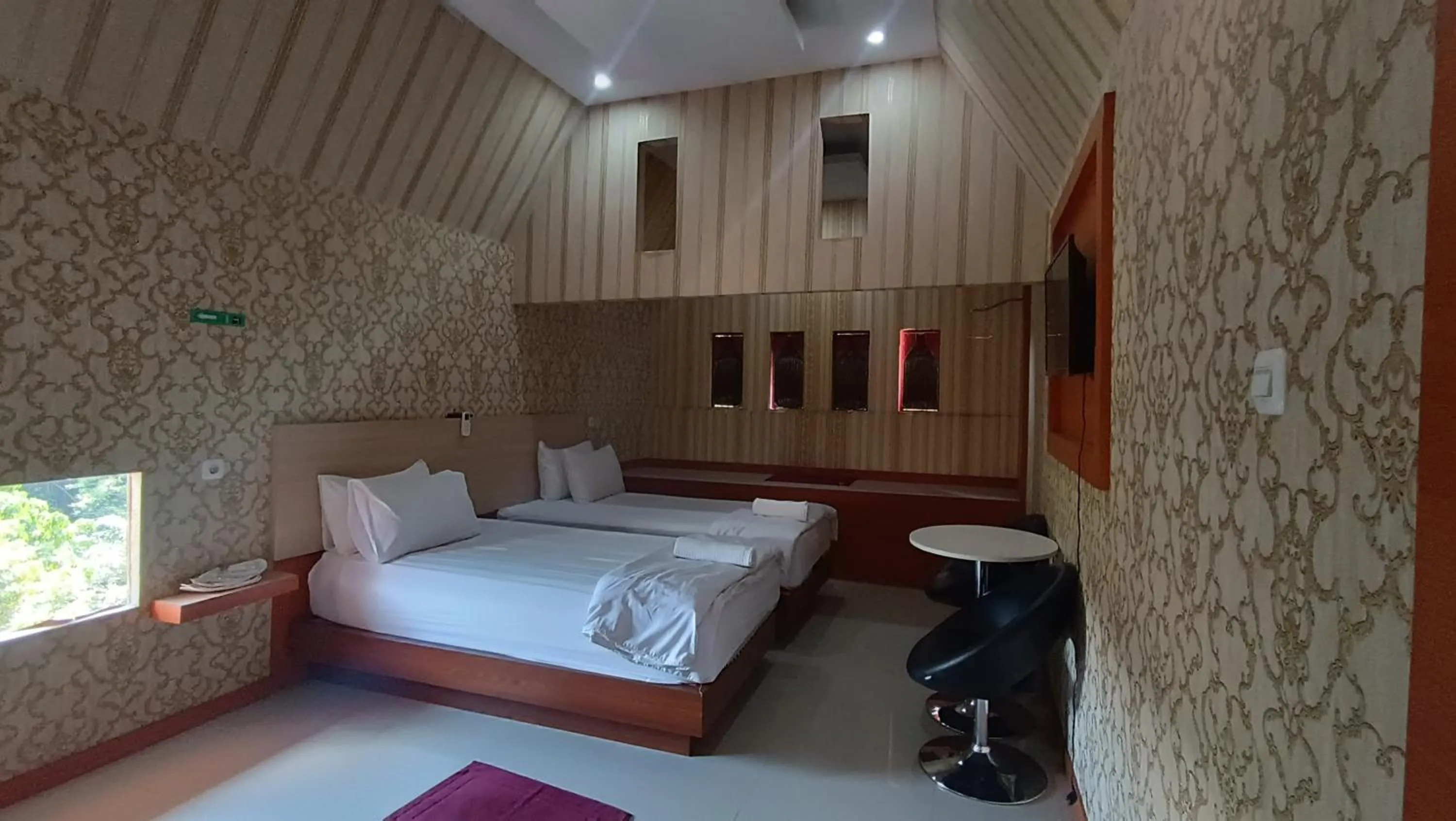 Bed in Hotel Manggasa Makale