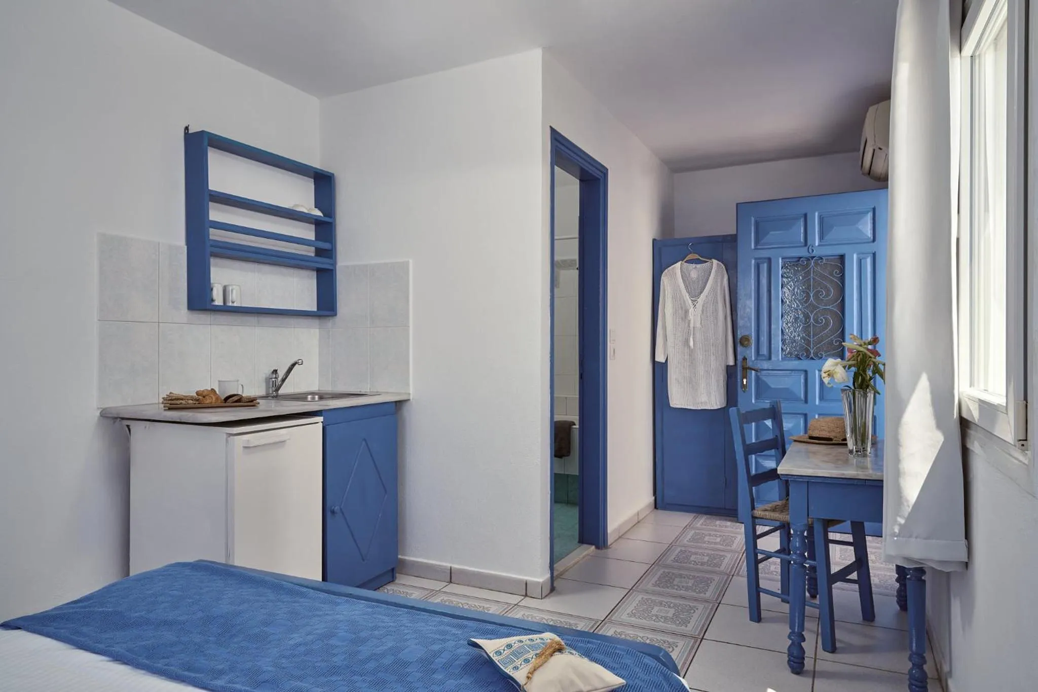 Bed in Amphitheater Cave Houses