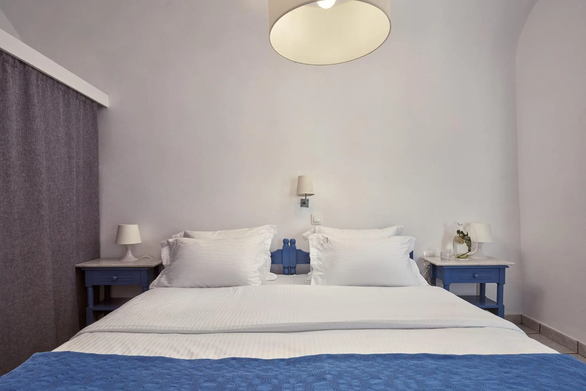 Bed in Amphitheater Cave Houses