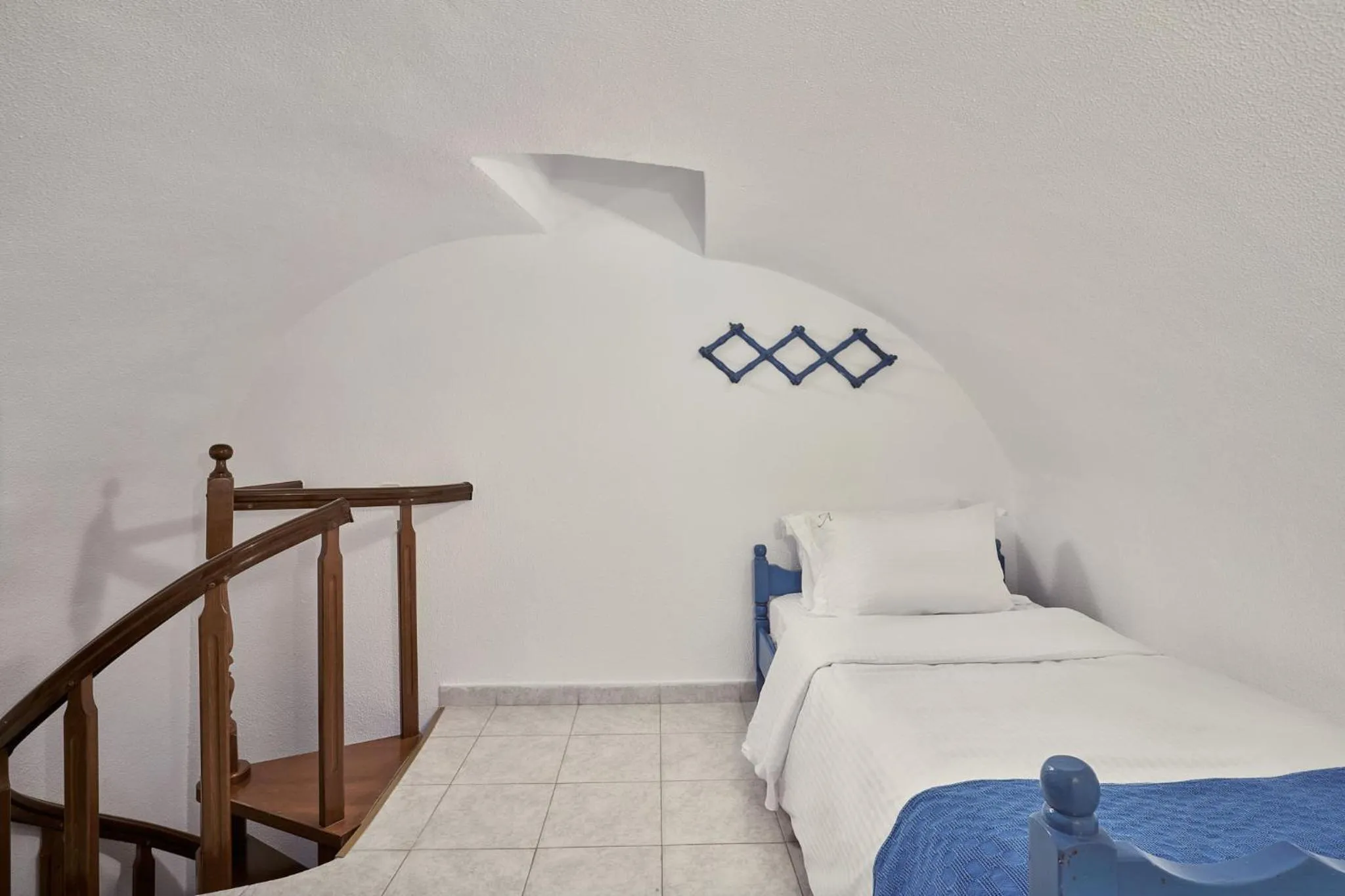 Bed in Amphitheater Cave Houses