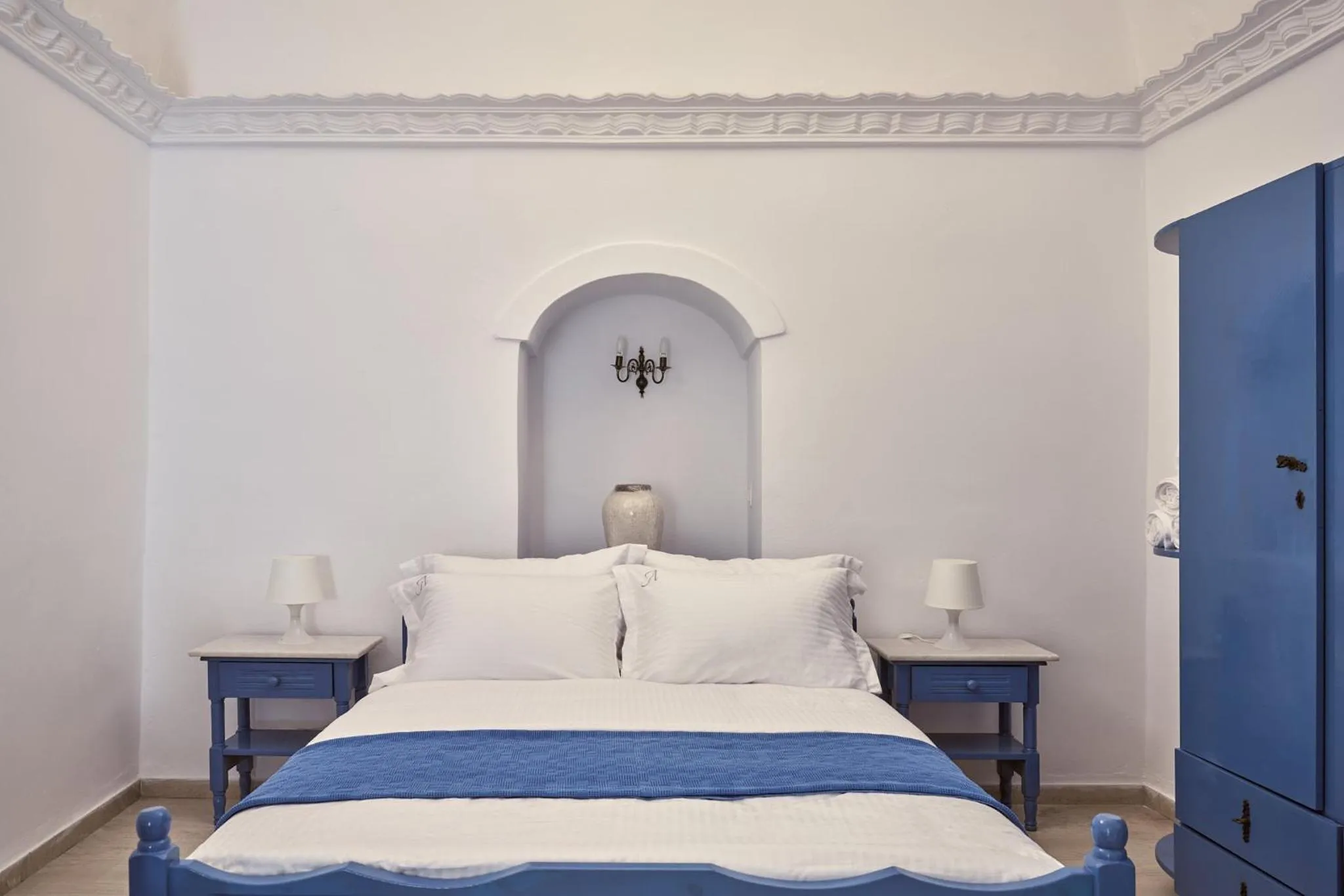 Bed in Amphitheater Cave Houses