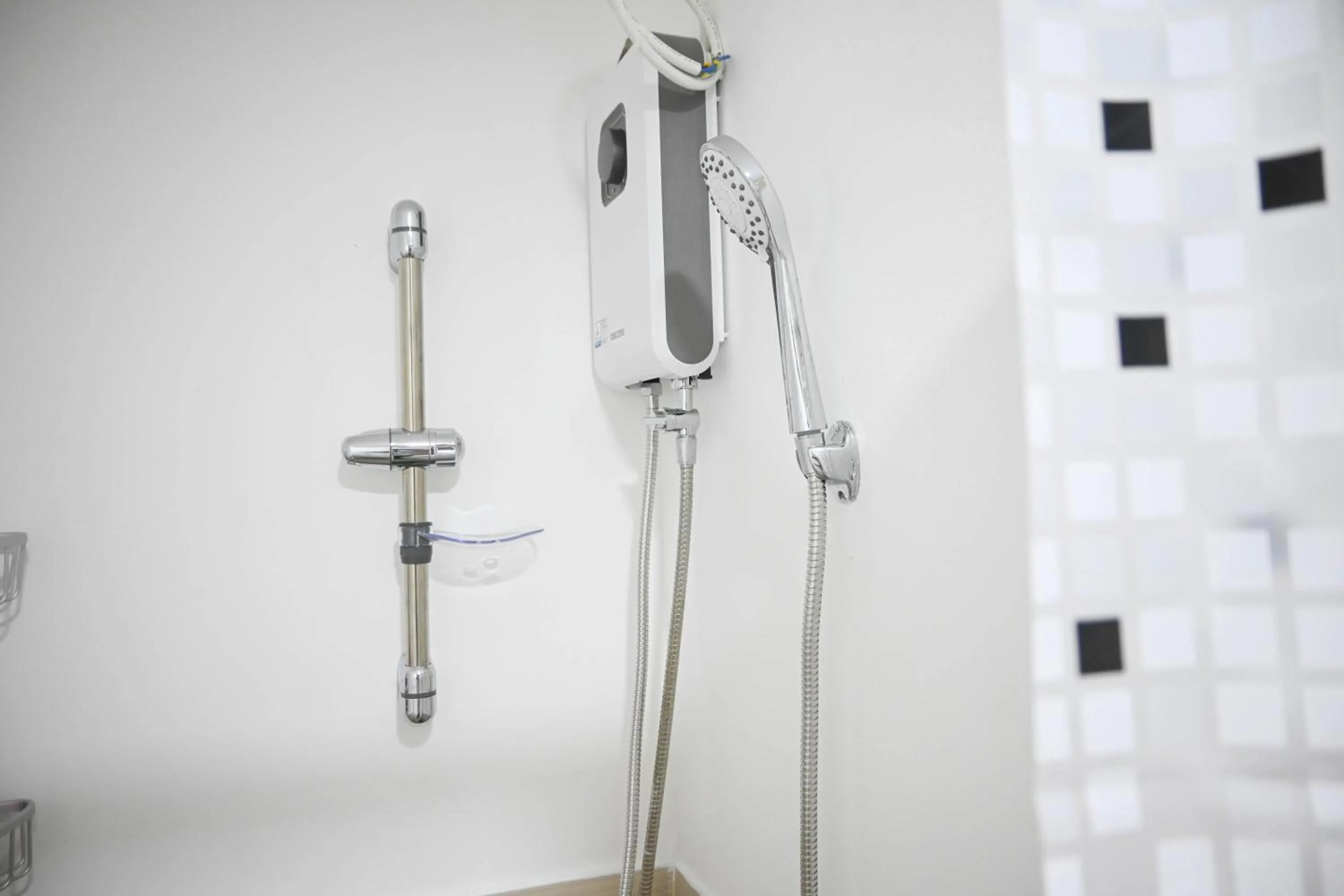 Shower in Cozy Belle Suite Relaxing Place at SMDC Hope Residences