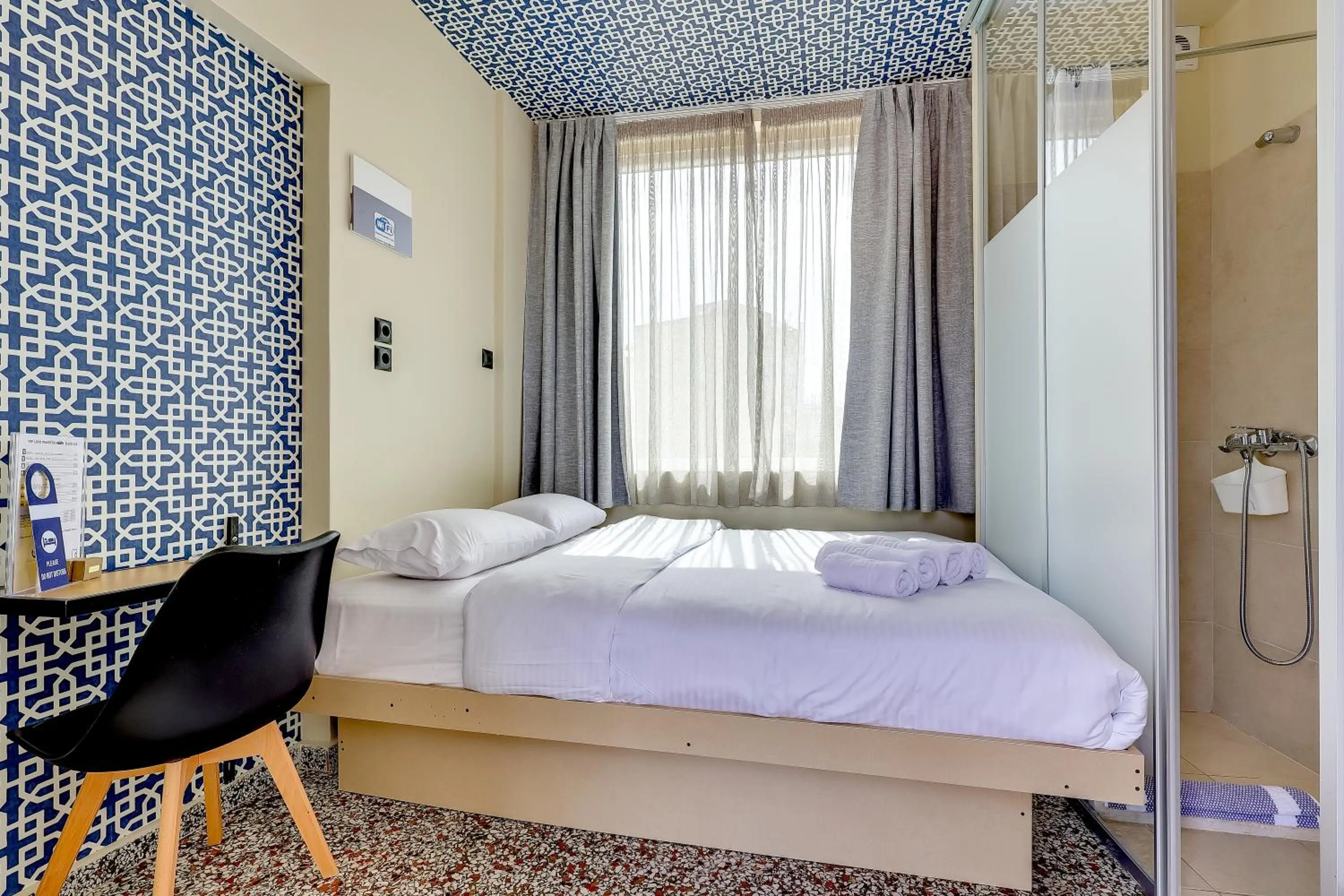 Photo of the whole room, Bed in 7ATHENS