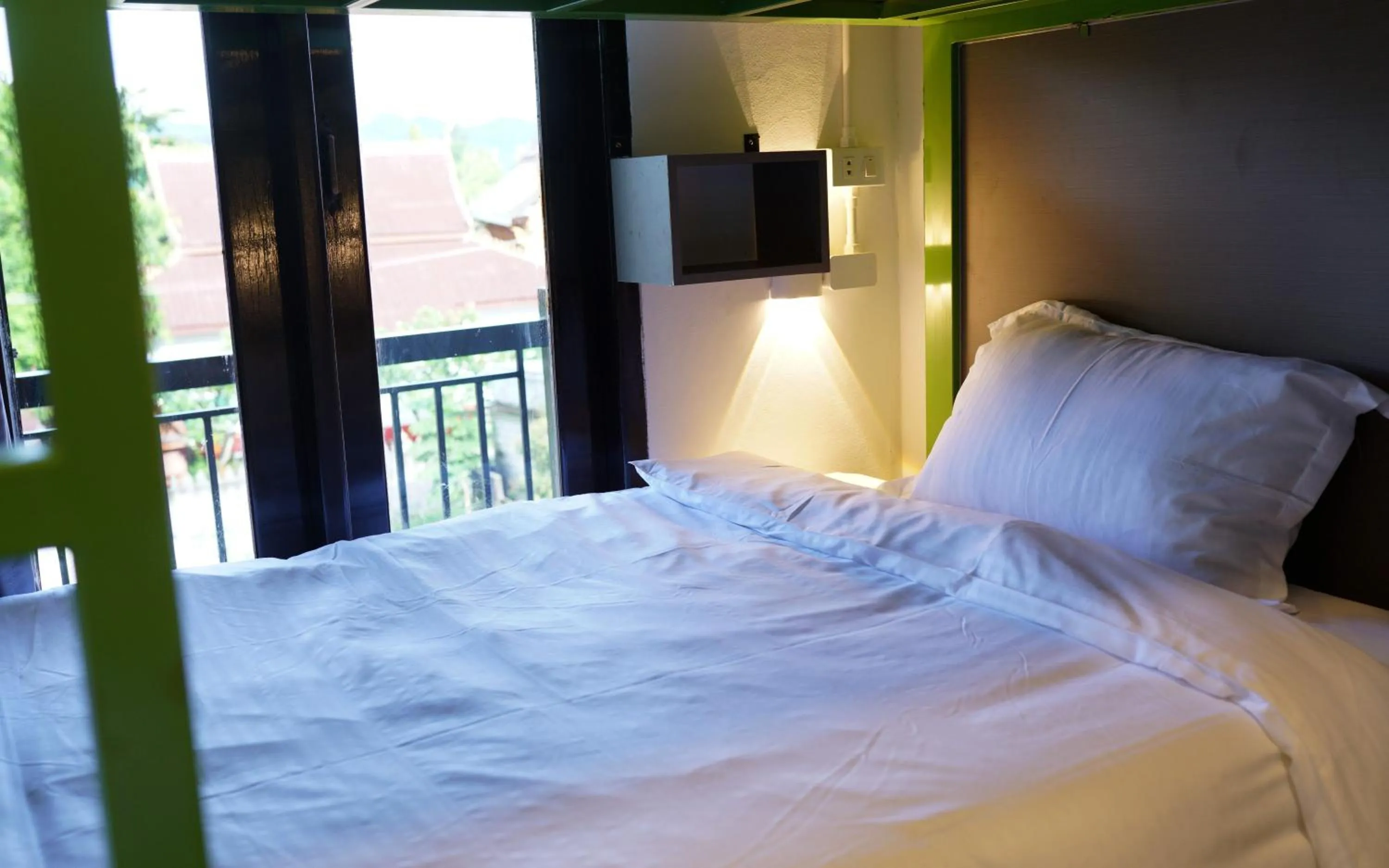 Bed in Mad Monkey Vang Vieng