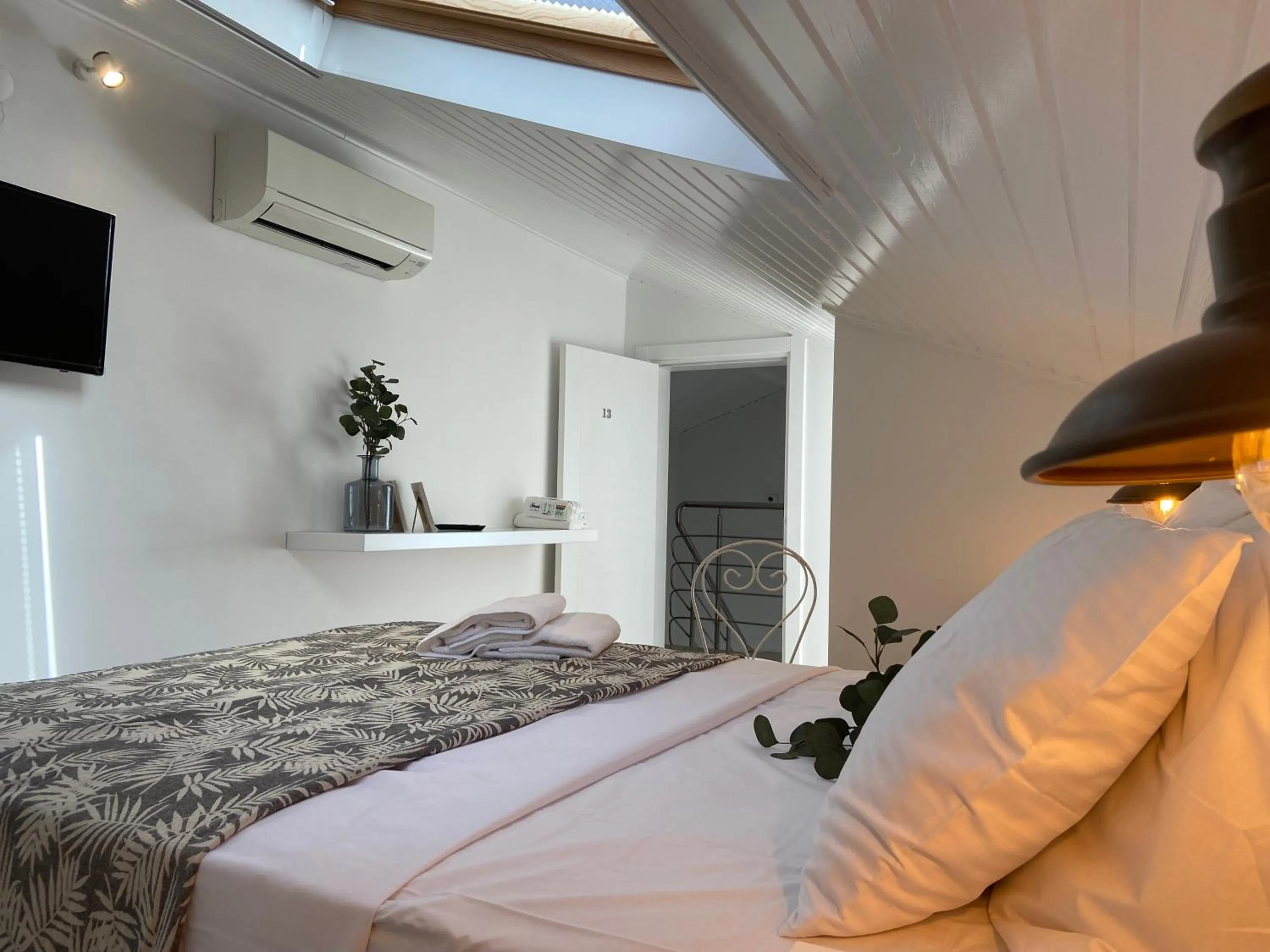 Bed in Alacati Moonbox Hotel