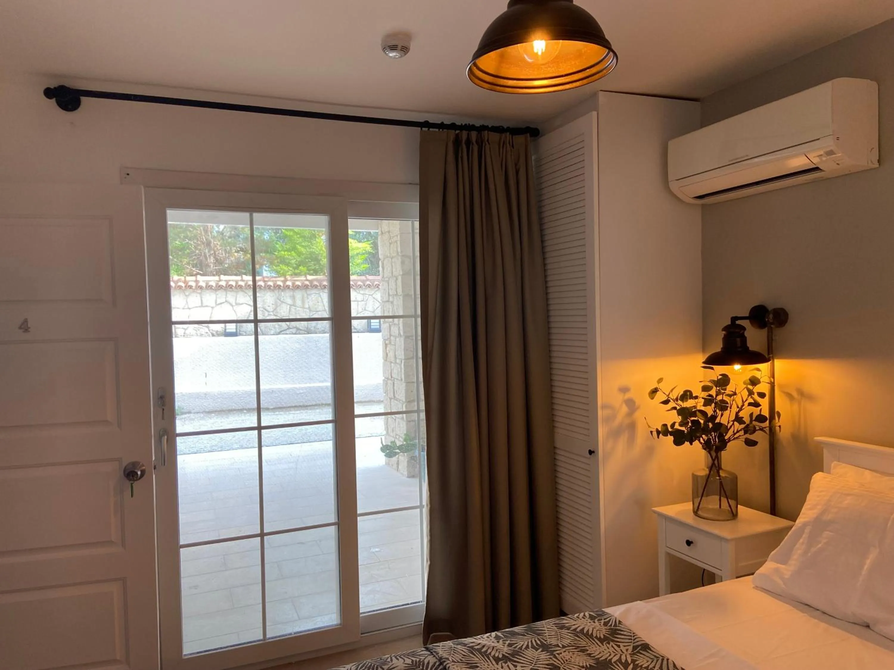 Bed in Alacati Moonbox Hotel