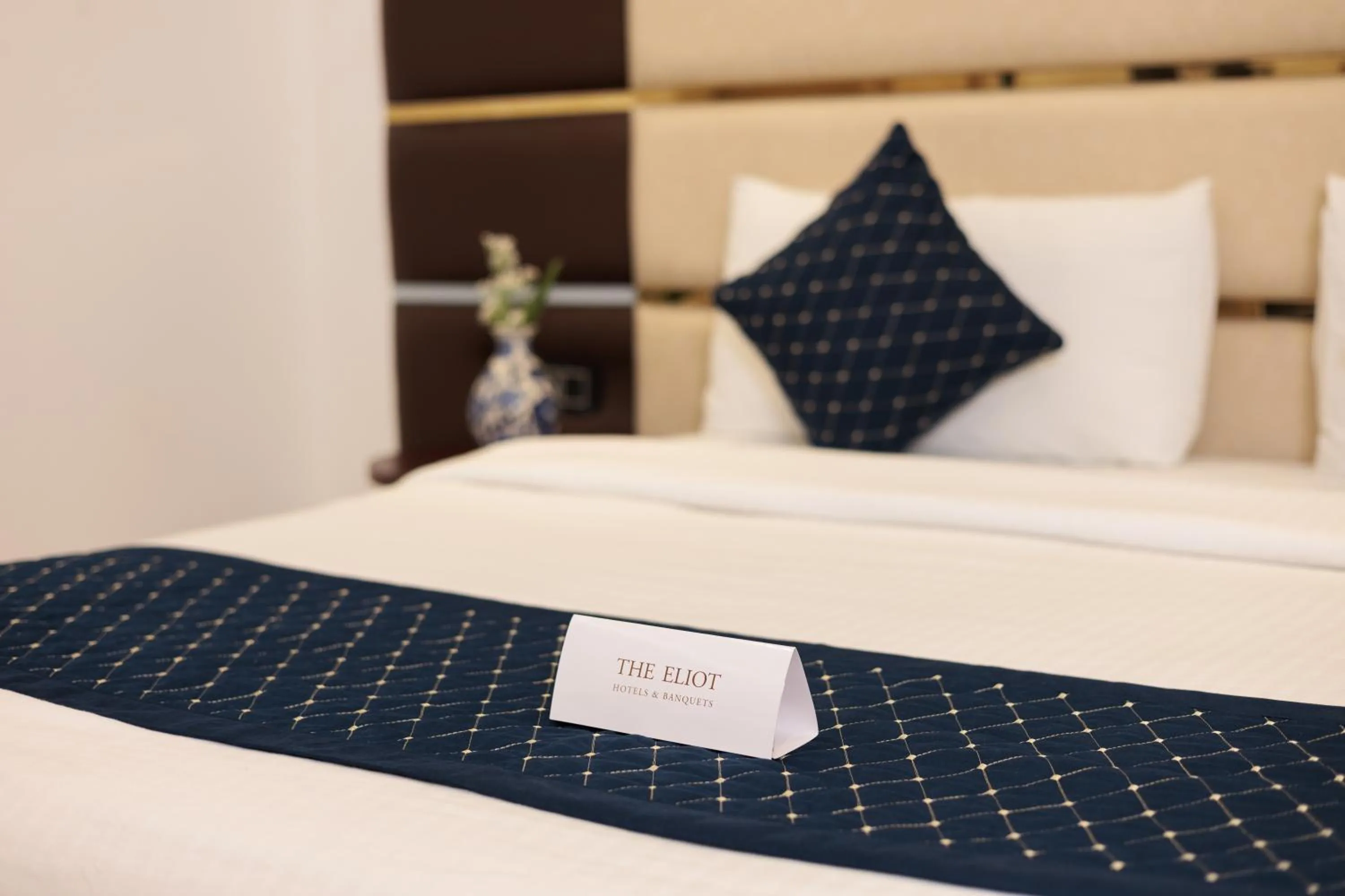 Bed in The Eliot Hotel & Banquet