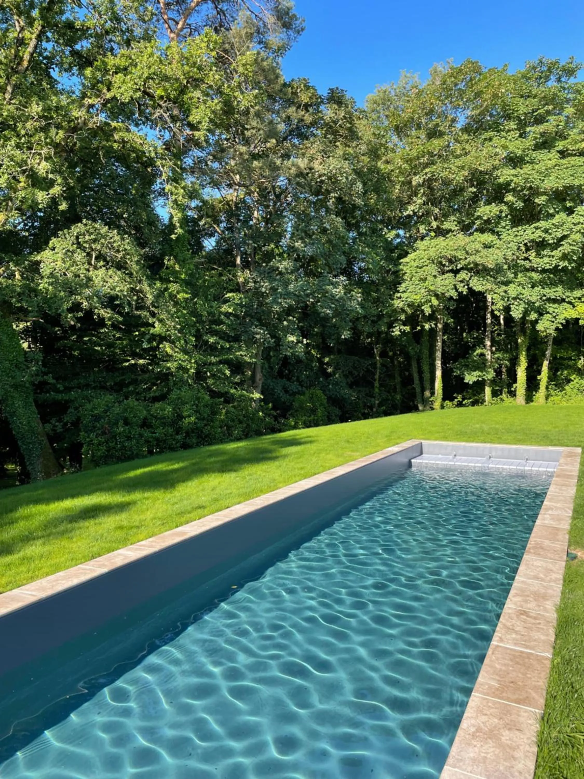 Pool view in Château de la Huberdière