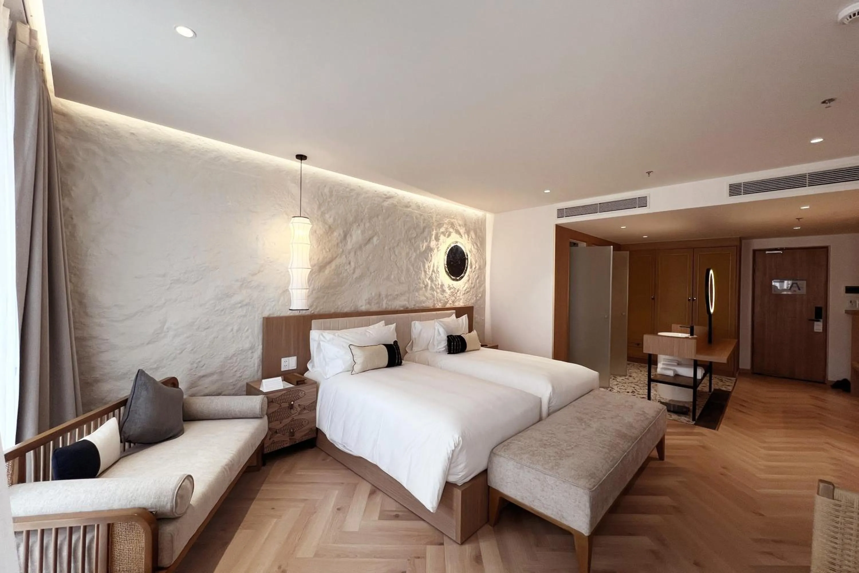 Bed in Wyndham Hoi An Royal Beachfront Resort & Villas