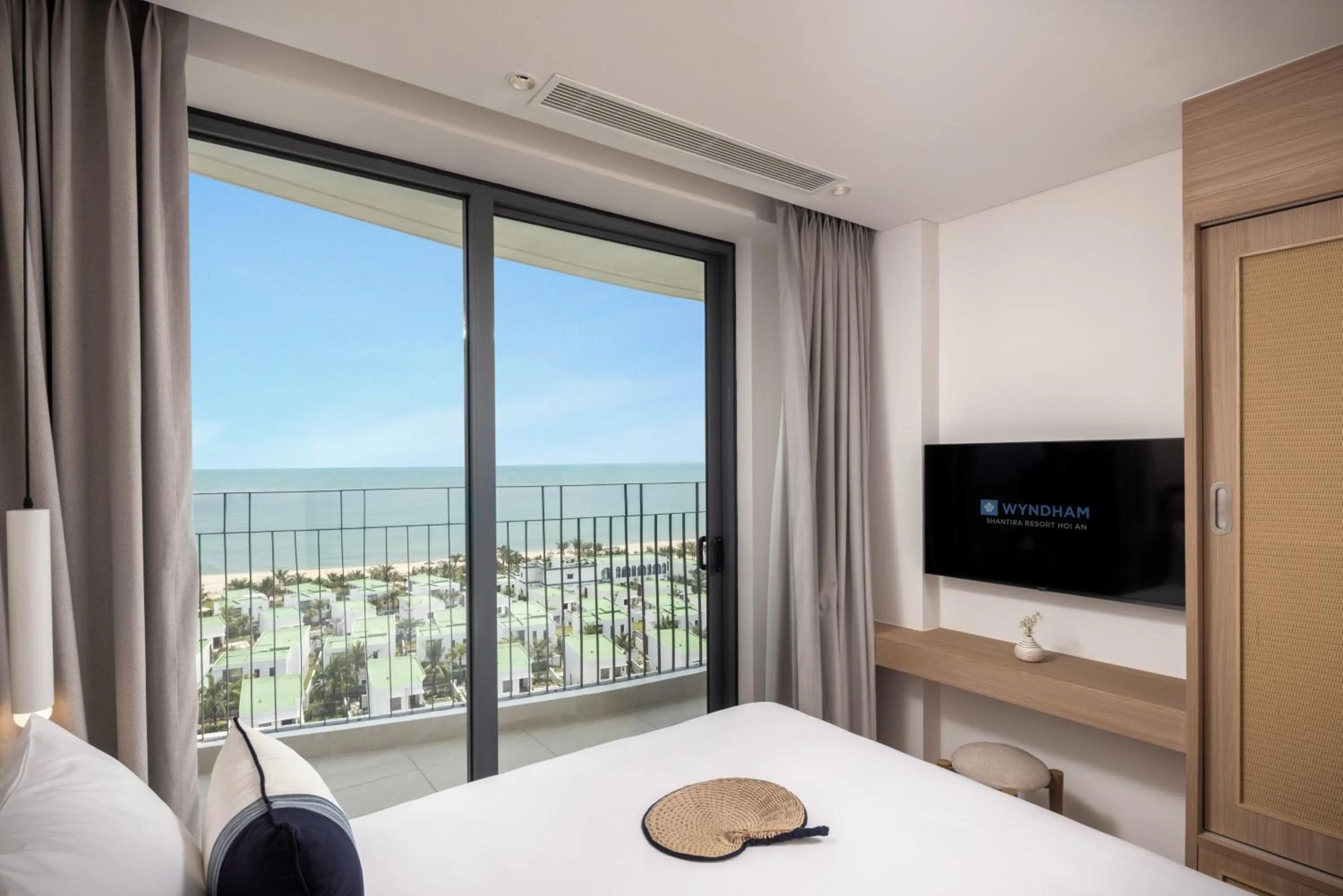 Bed in Wyndham Hoi An Royal Beachfront Resort & Villas