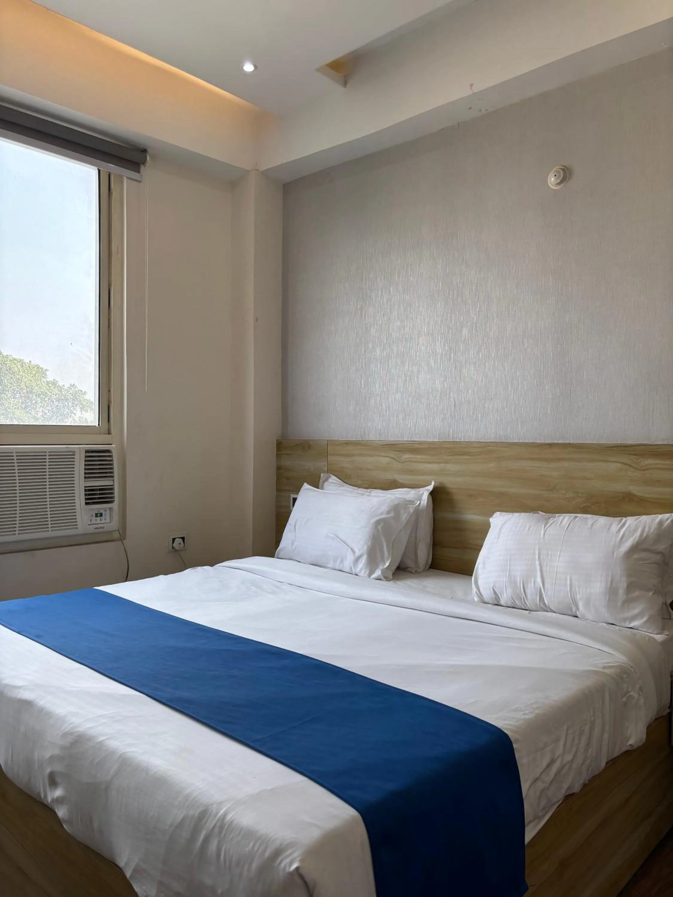 Bed in Dolphin Club And Resort