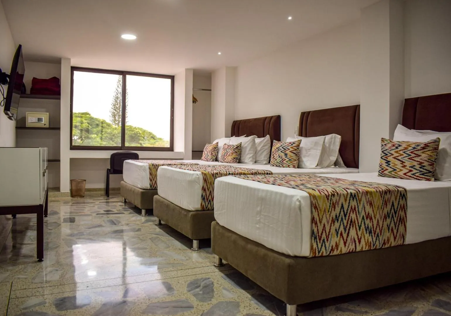 Bed in Hotel Arisha Cali