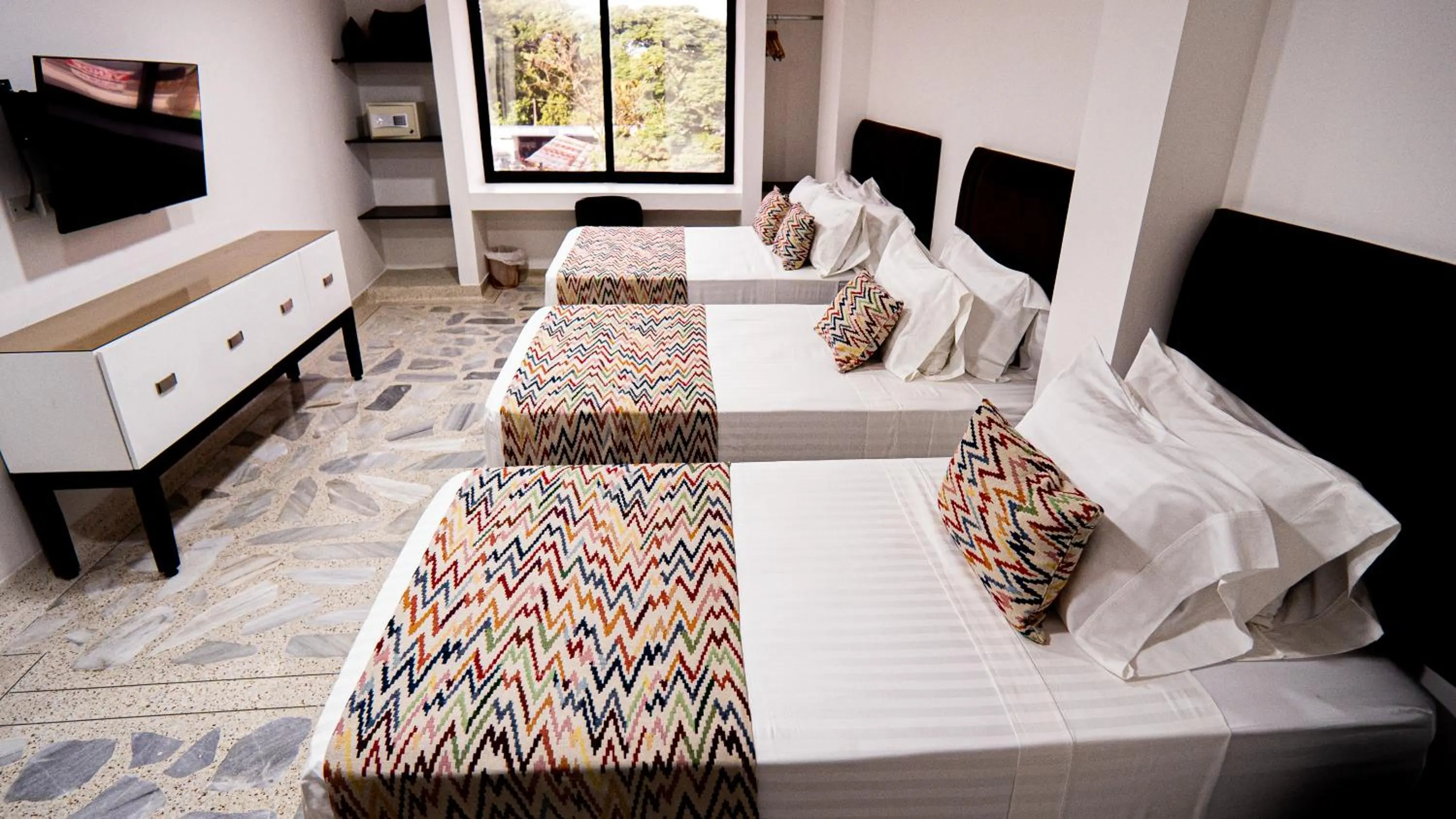 Bed in Hotel Arisha Cali