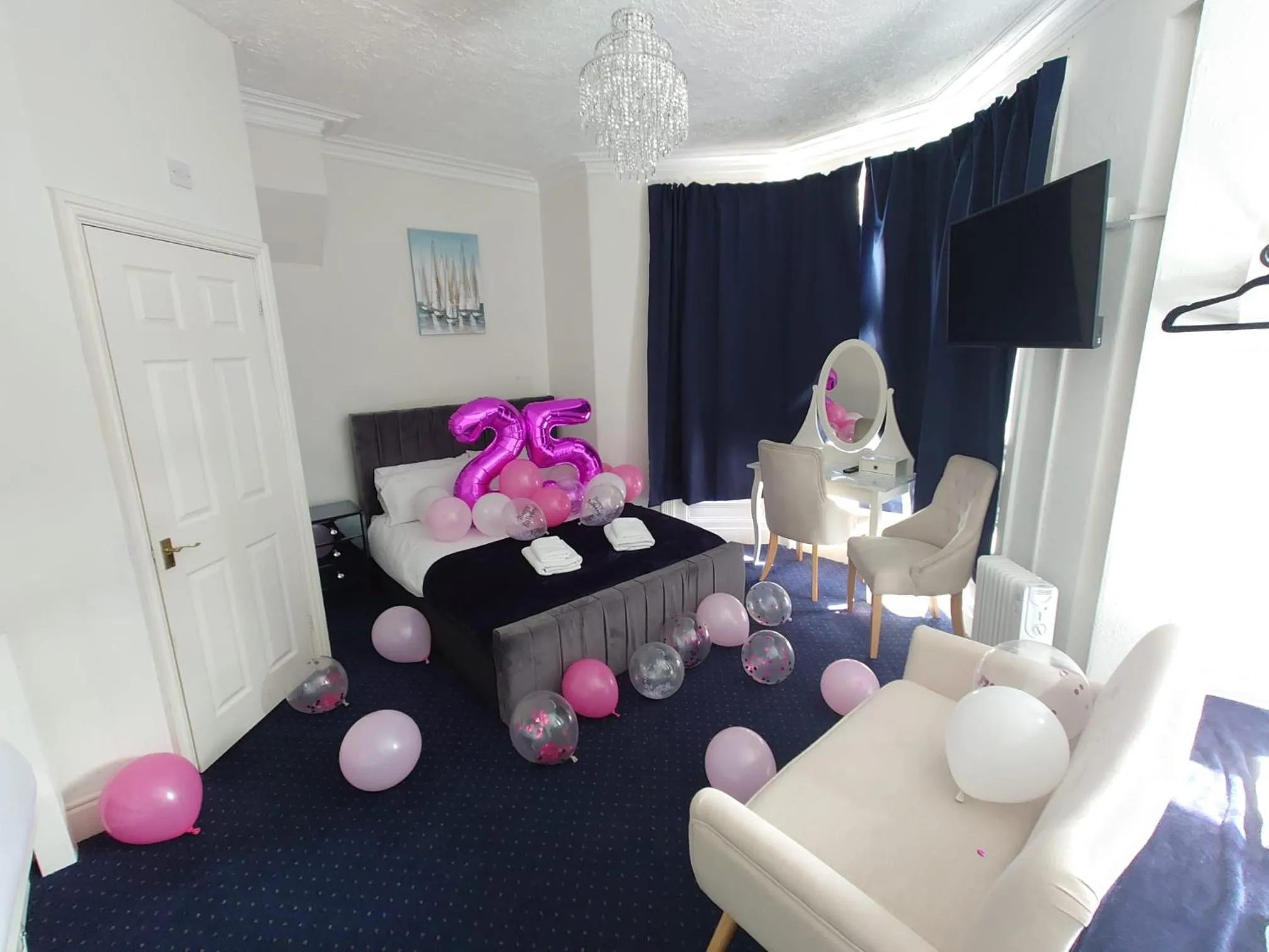 Bed in Harriette's Guest House