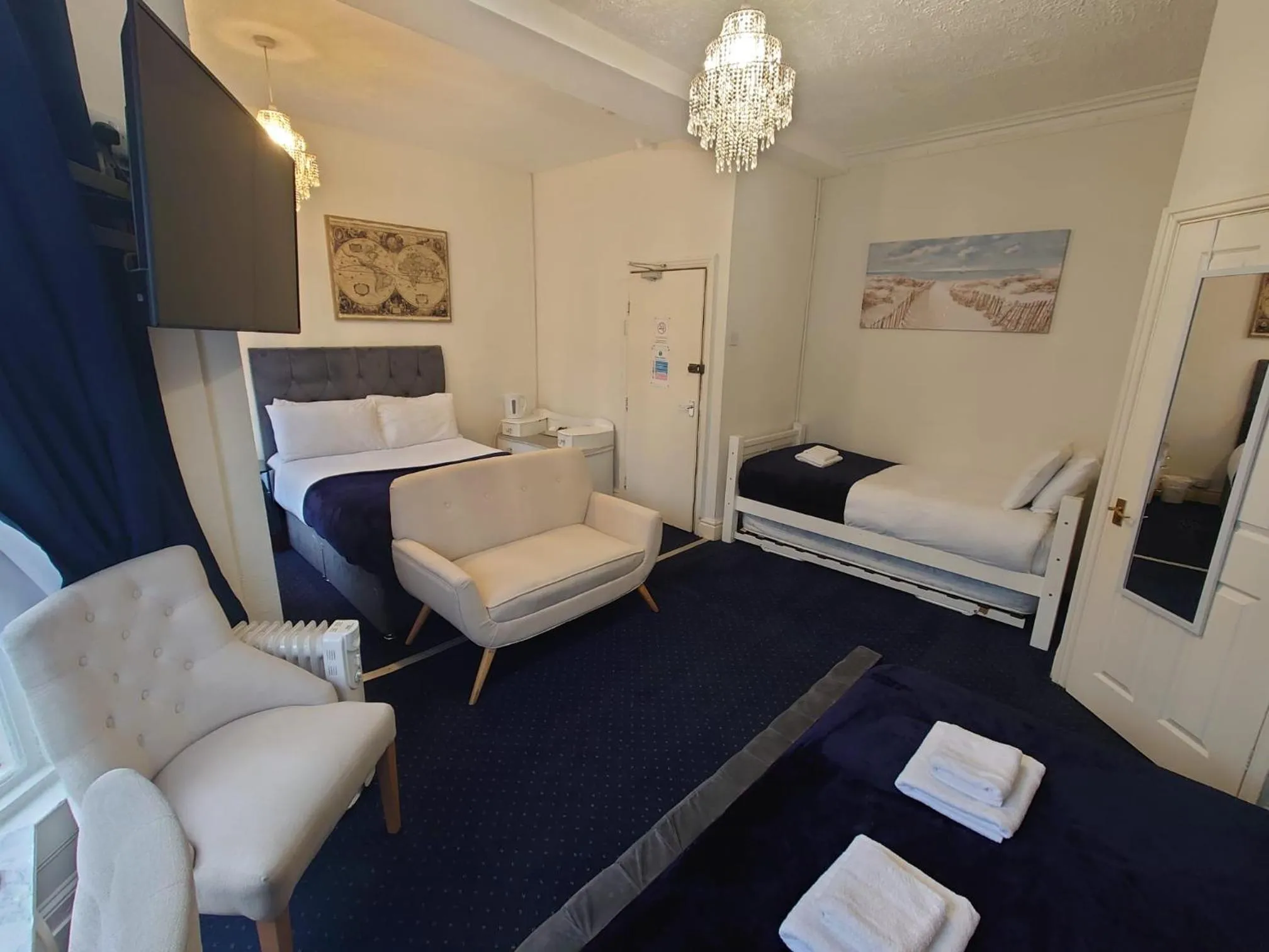 Bed in Harriette's Guest House