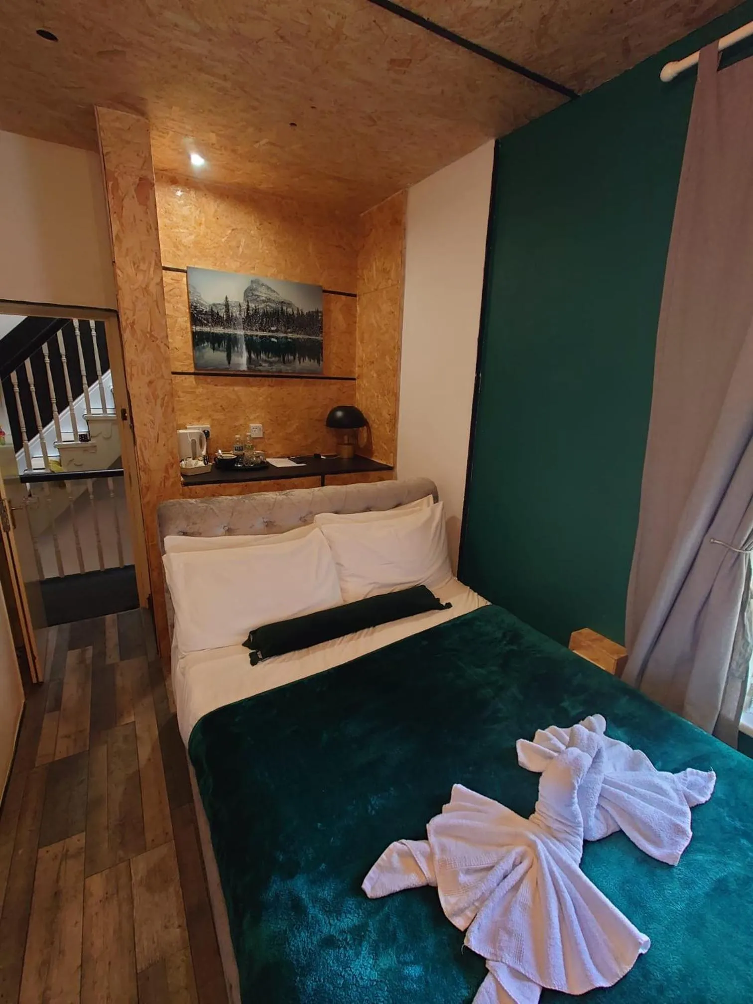 Bed in Harriette's Guest House