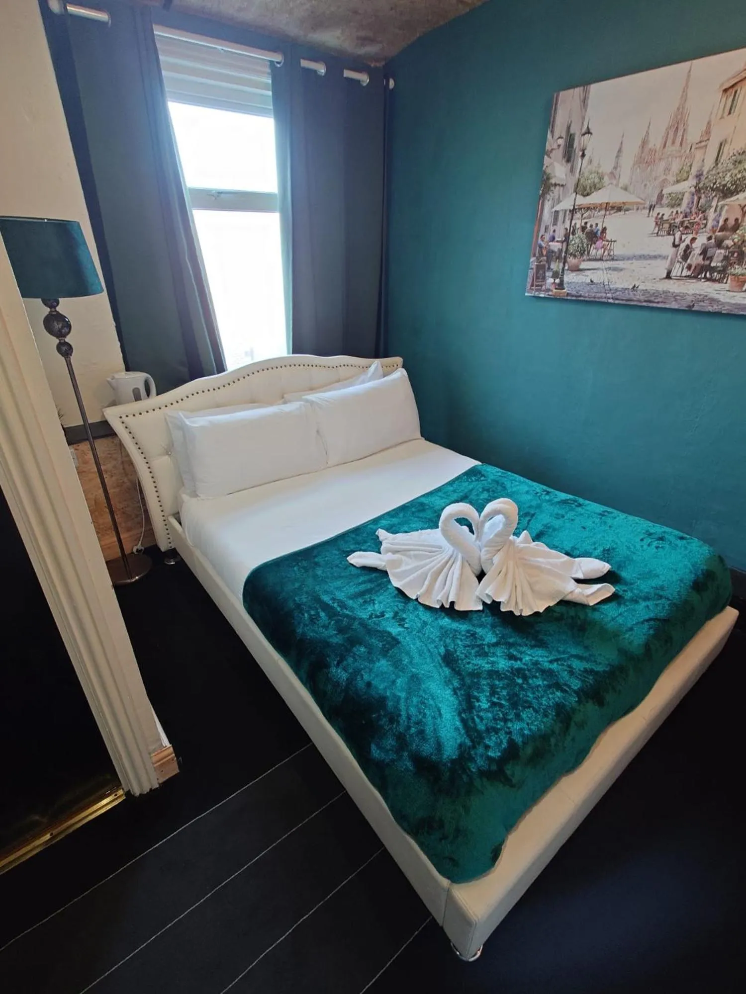 Bed in Harriette's Guest House