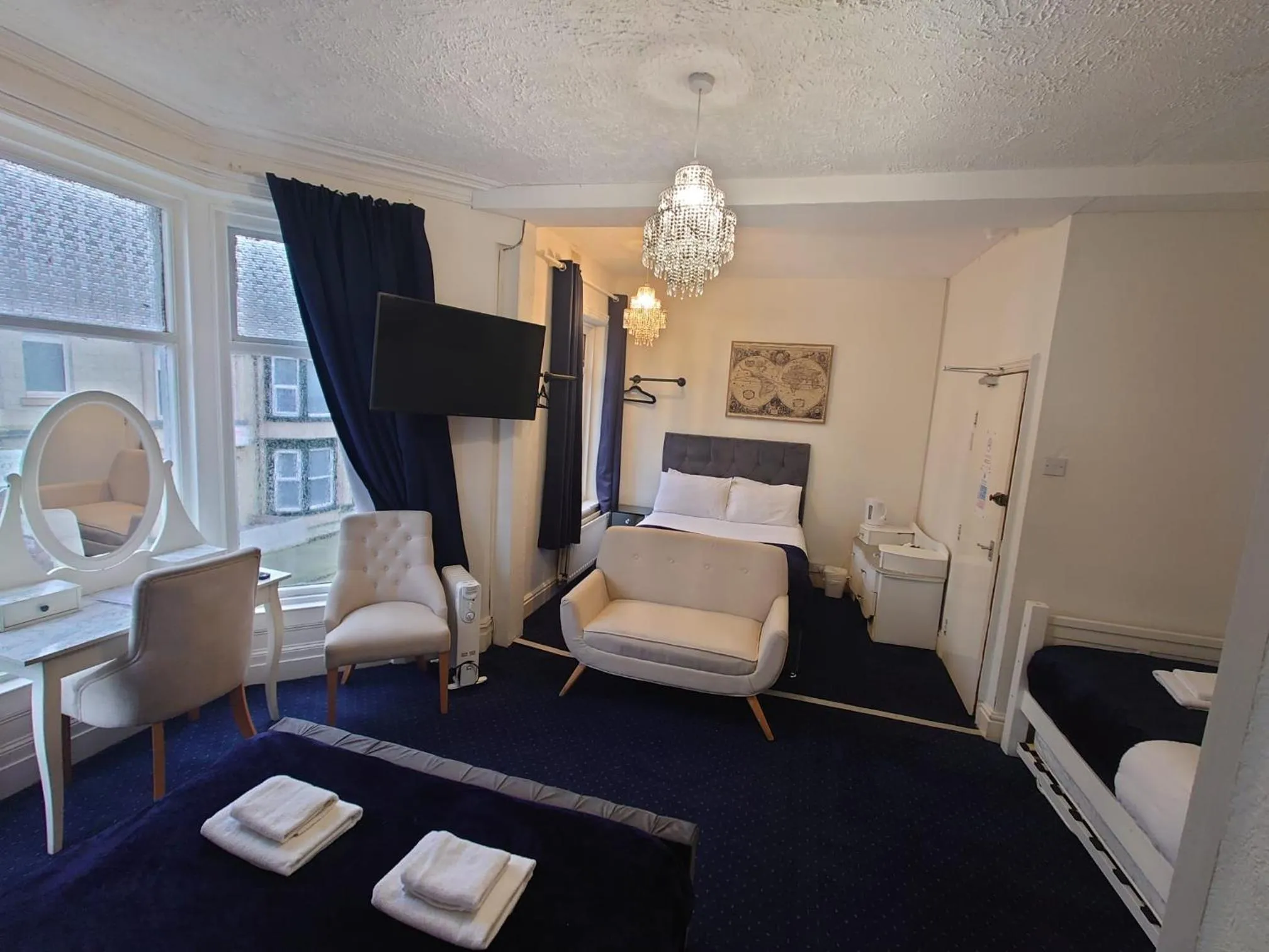 Bed in Harriette's Guest House