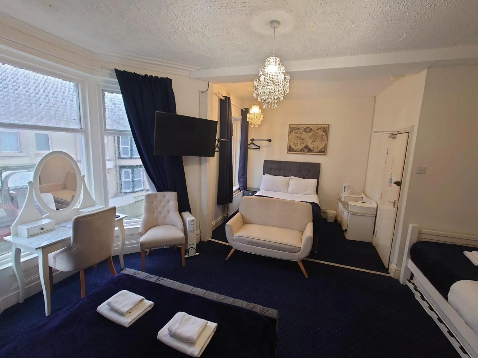 Bed in Harriette's Guest House