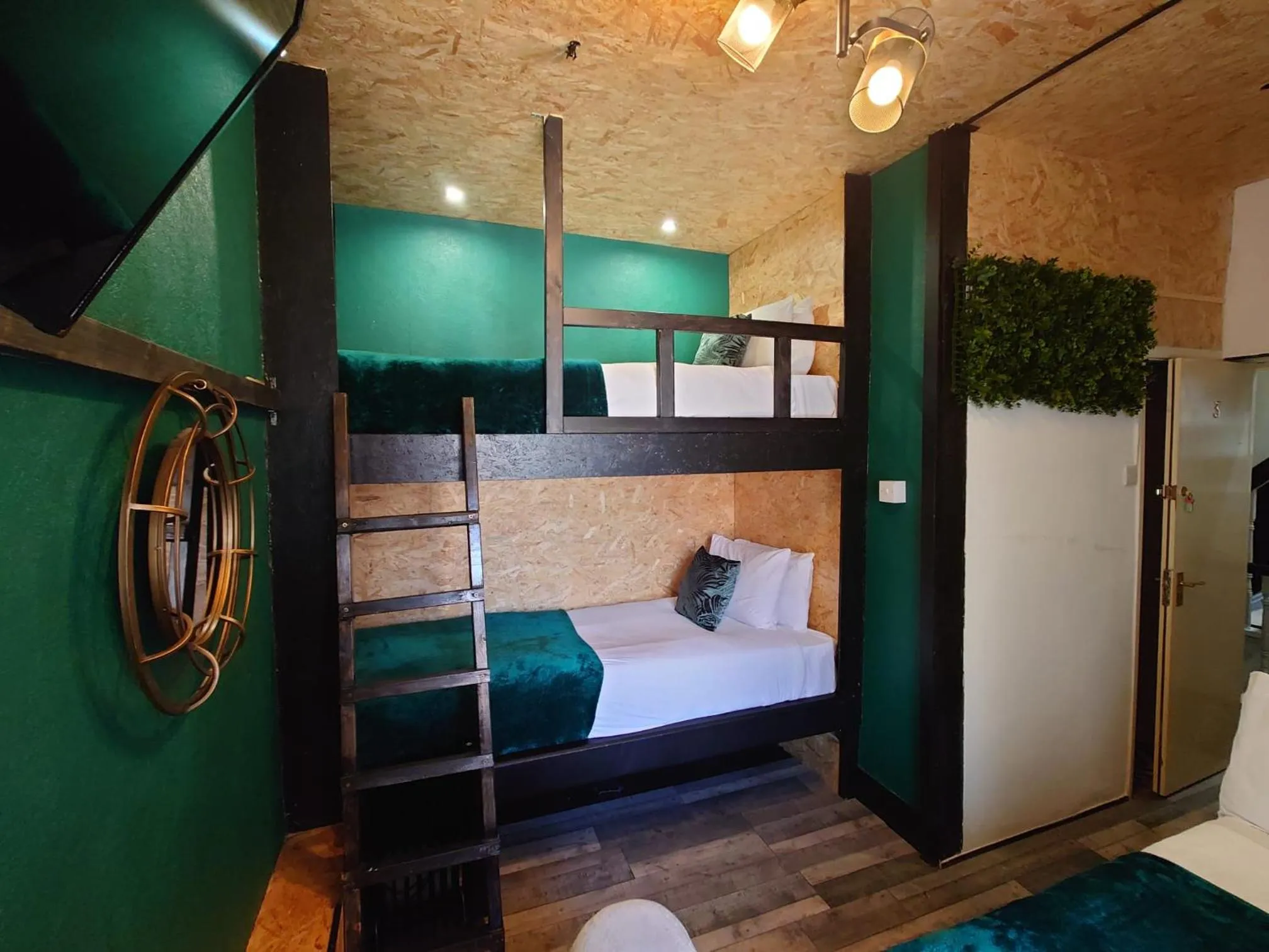 Bed in Harriette's Guest House