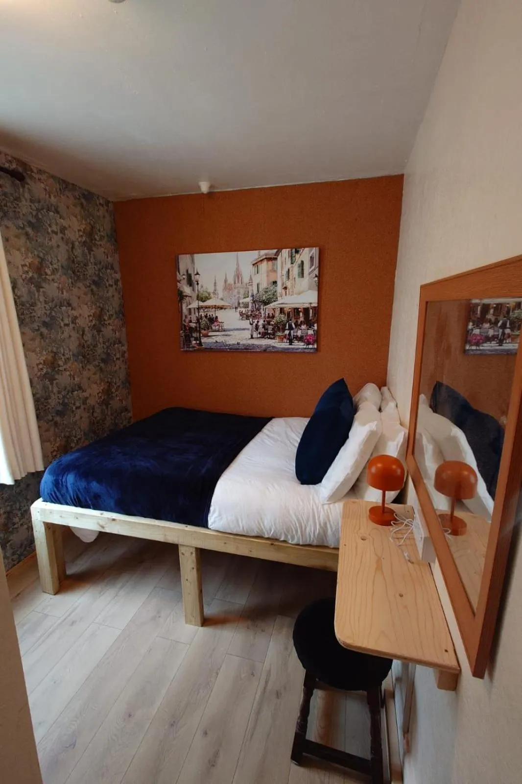 Bed in Harriette's Guest House