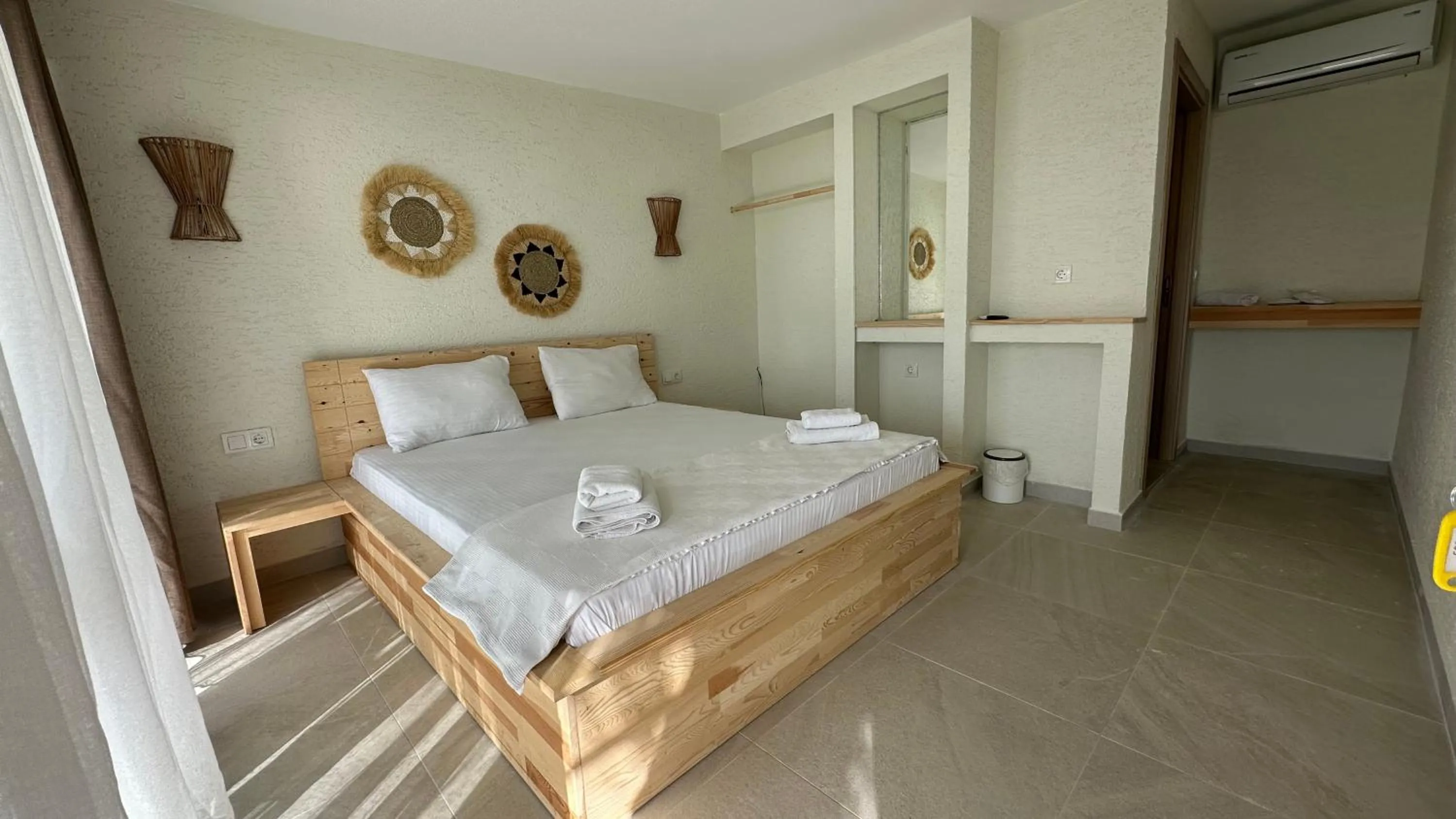 Photo of the whole room, Bed in The Roof Ada