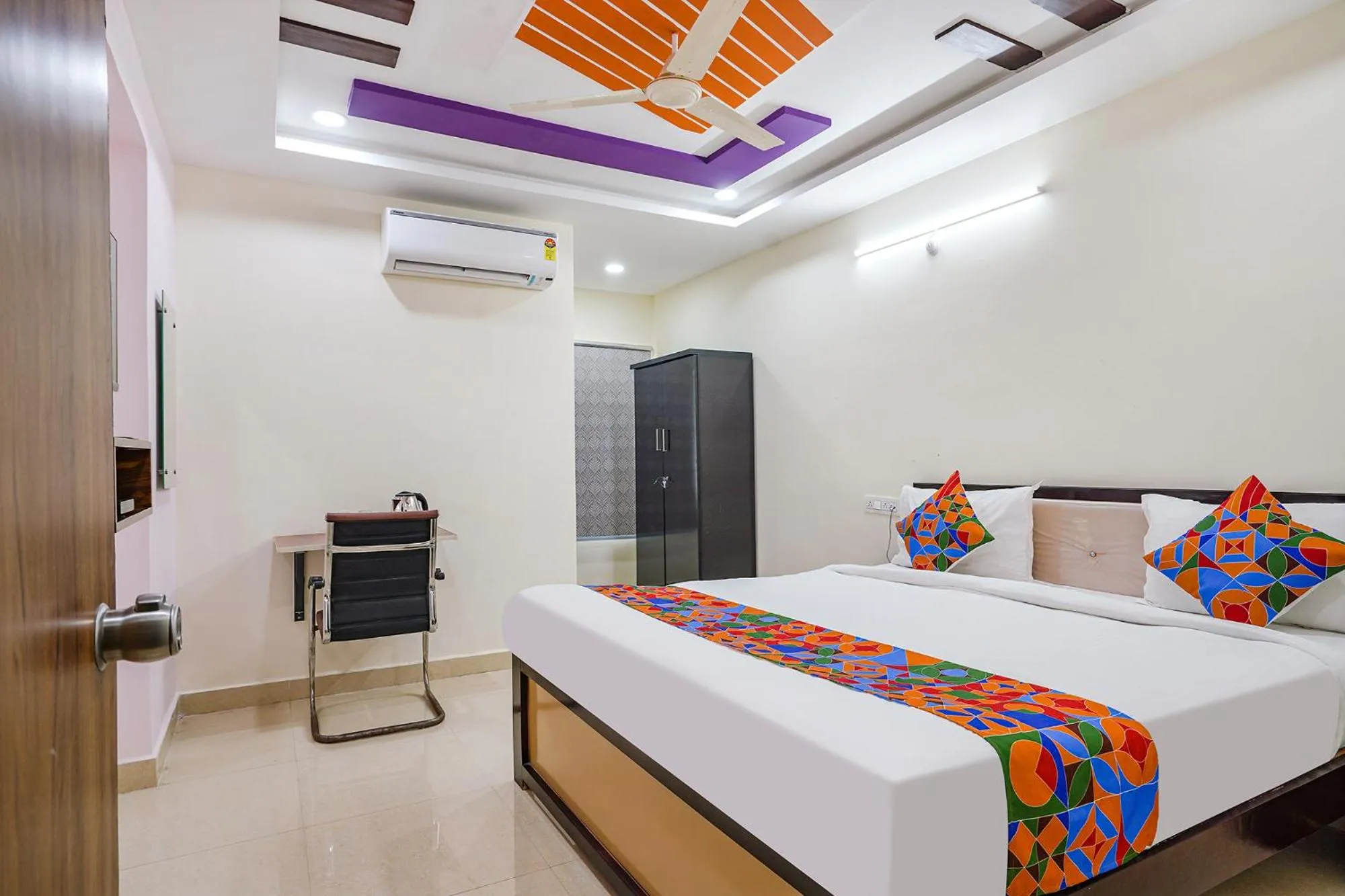 Bed in FabHotel Sri Karthikeya Grand - Nr Nexus Mall, Kukatpally