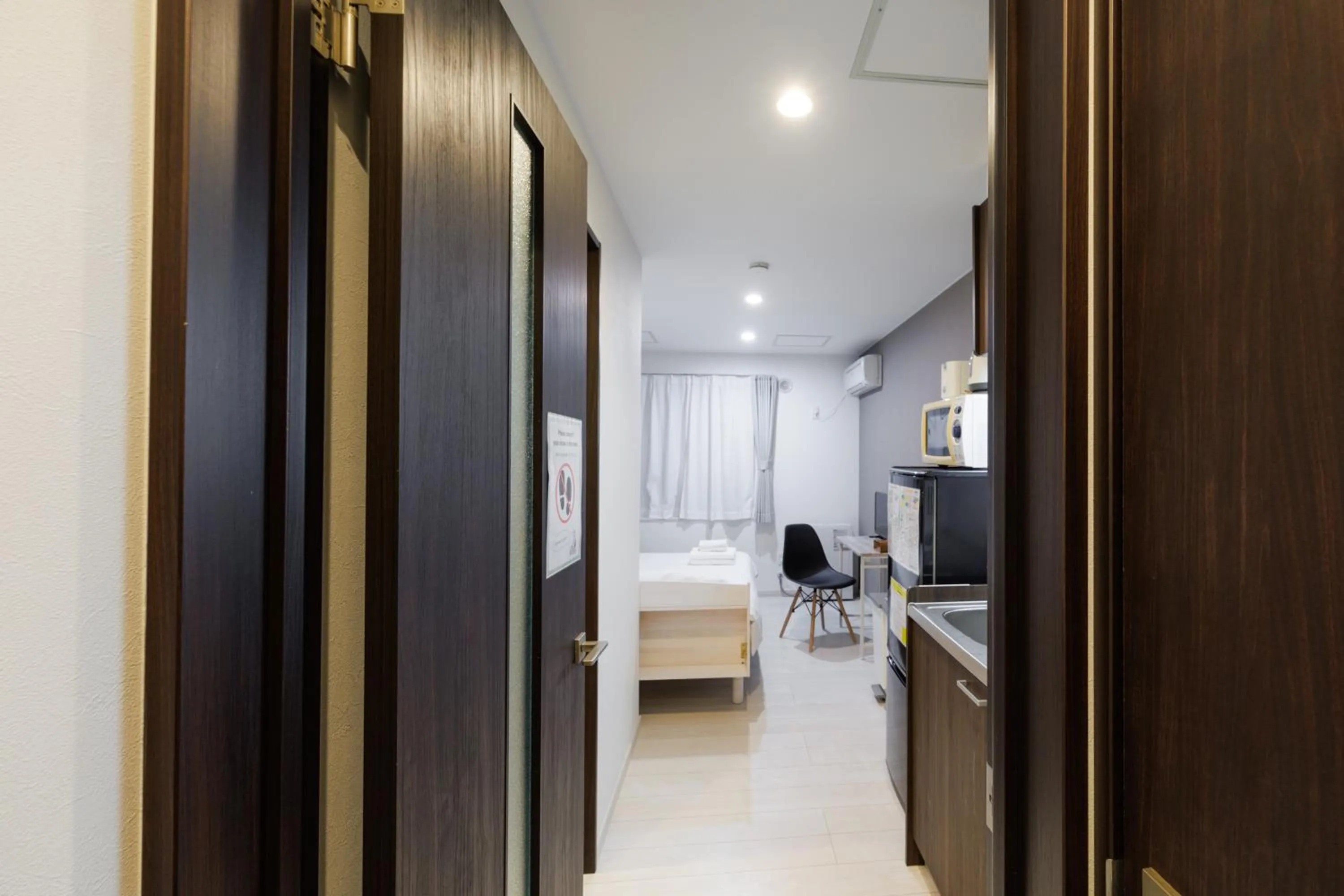 Living room, Bed in Niseko Hirafu Ski Resort Condo