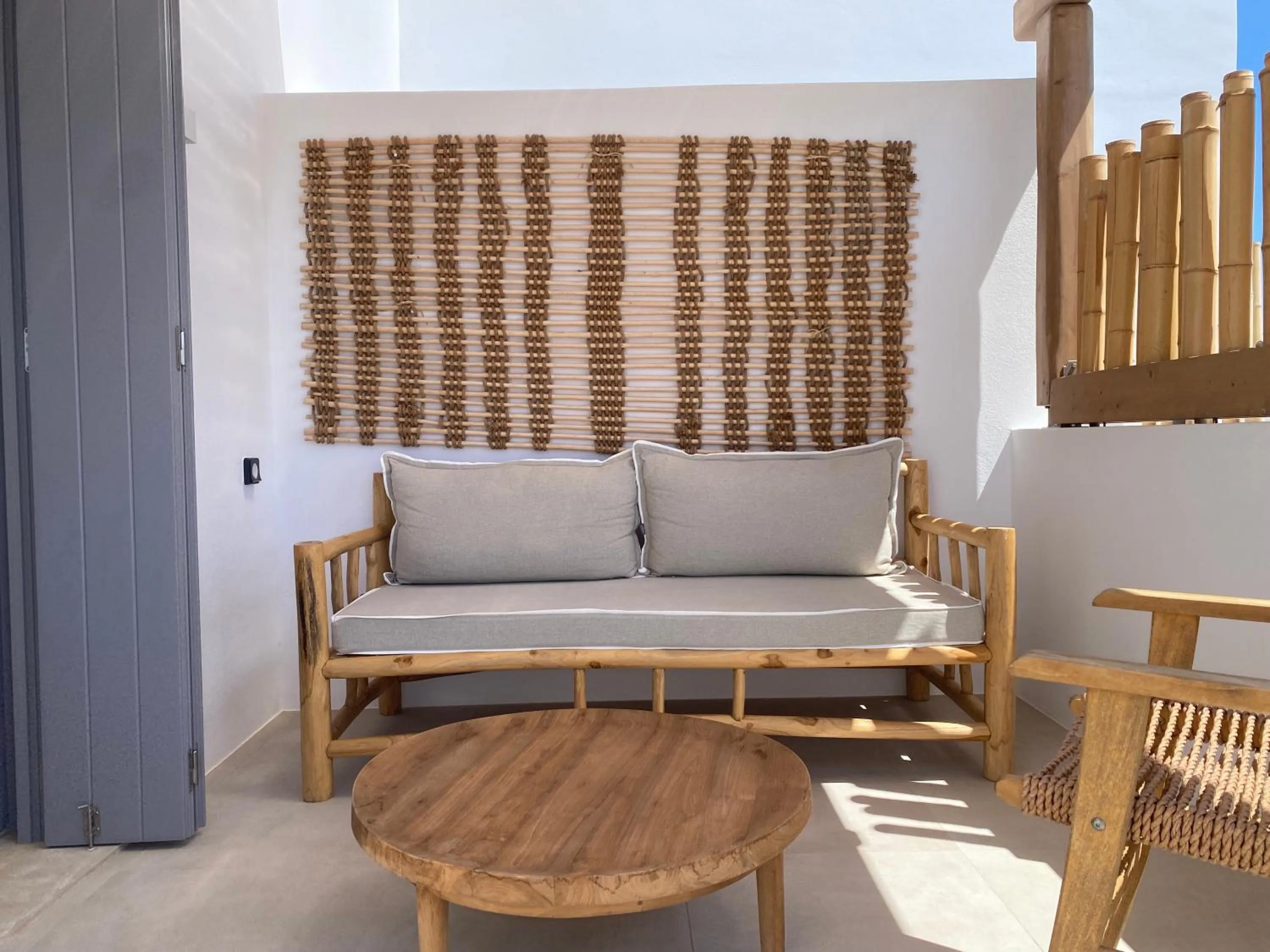 Seating area in Nove Milos Luxury by Estia