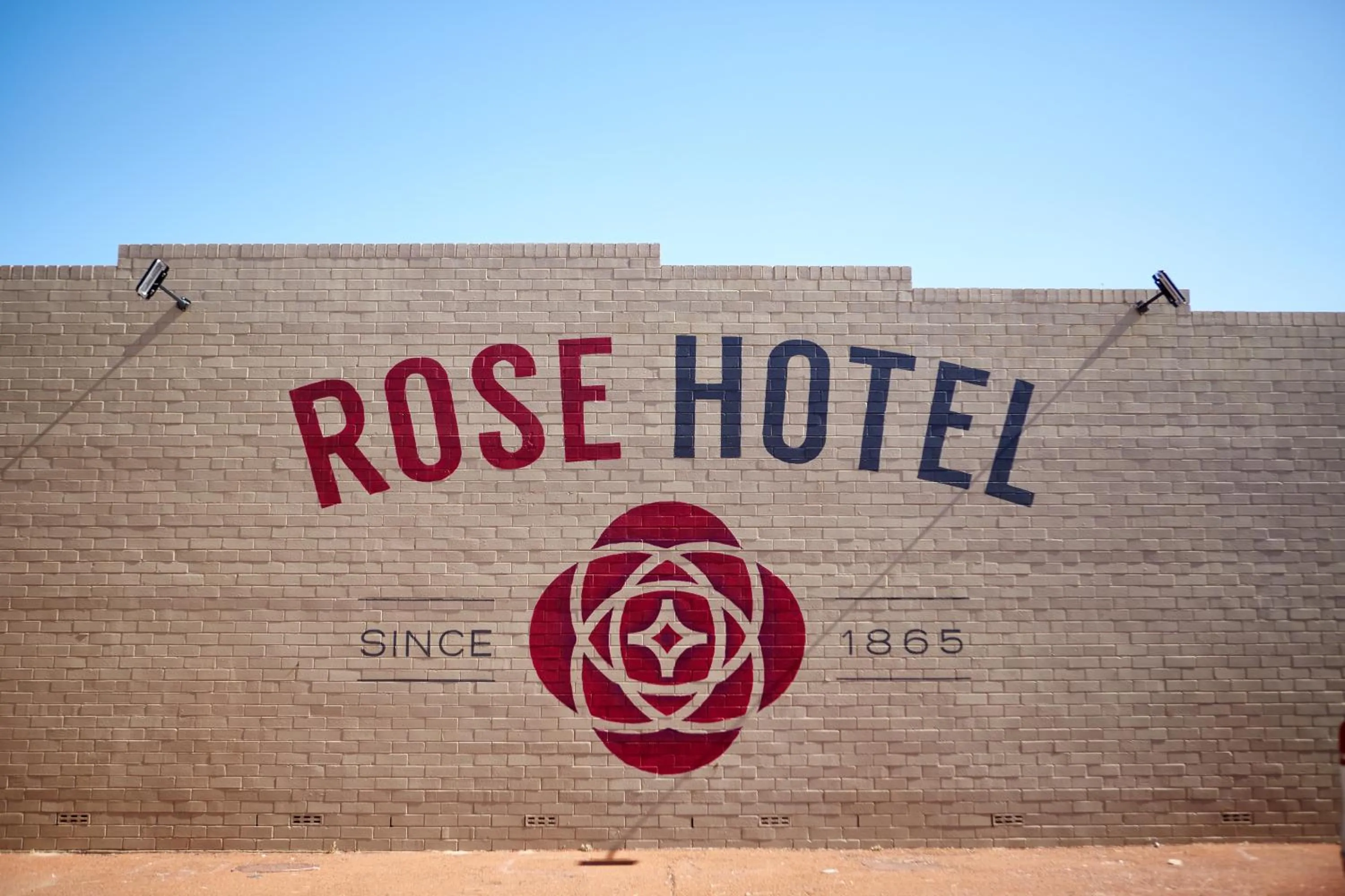 Property logo or sign in The Rose Hotel & Motel