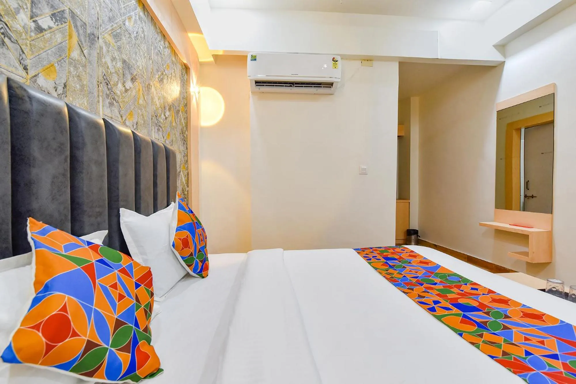 Bed in FabHotel Symphony Grand