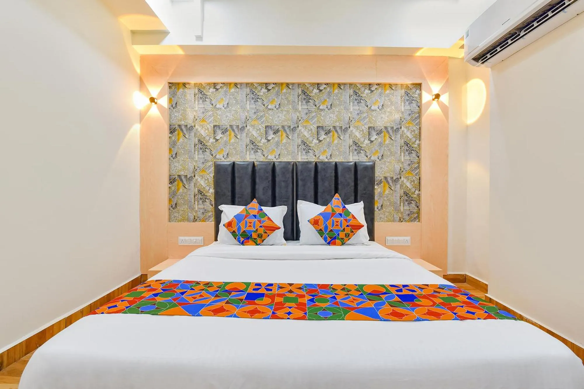 Bed in FabHotel Symphony Grand