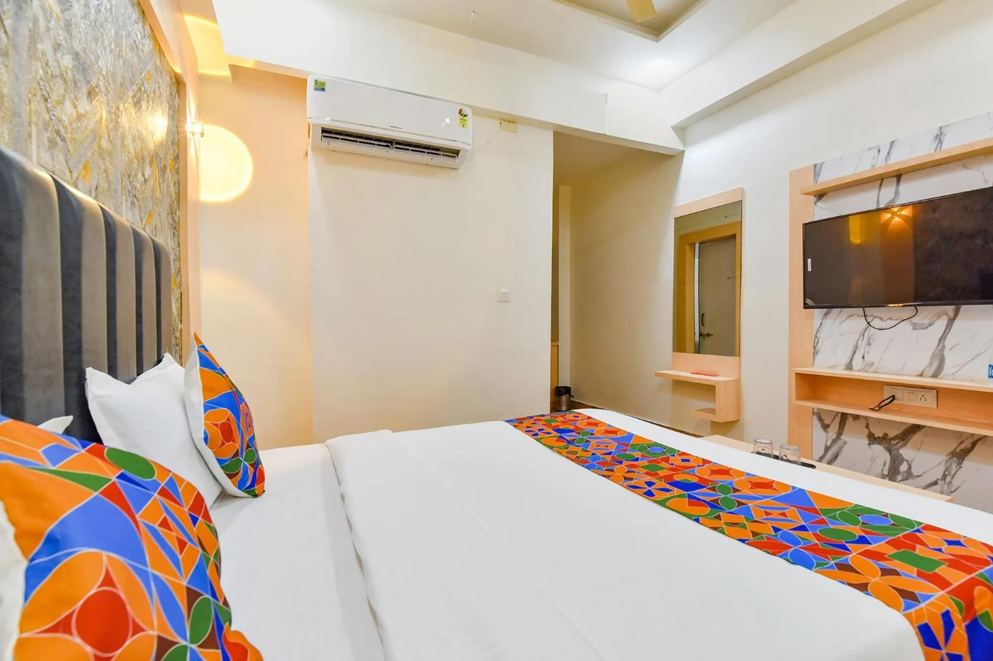 Bed in FabHotel Symphony Grand