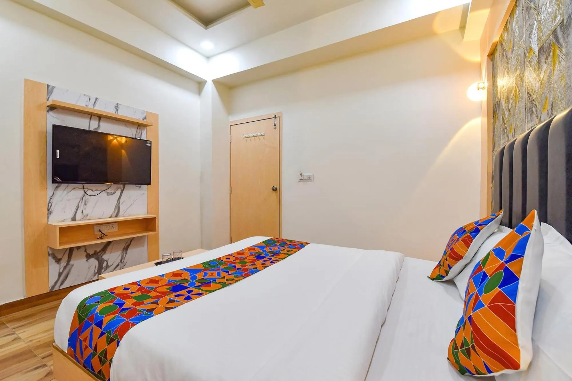 Bed in FabHotel Symphony Grand