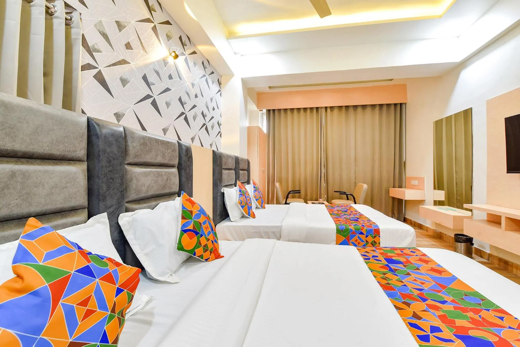 Bed in FabHotel Symphony Grand