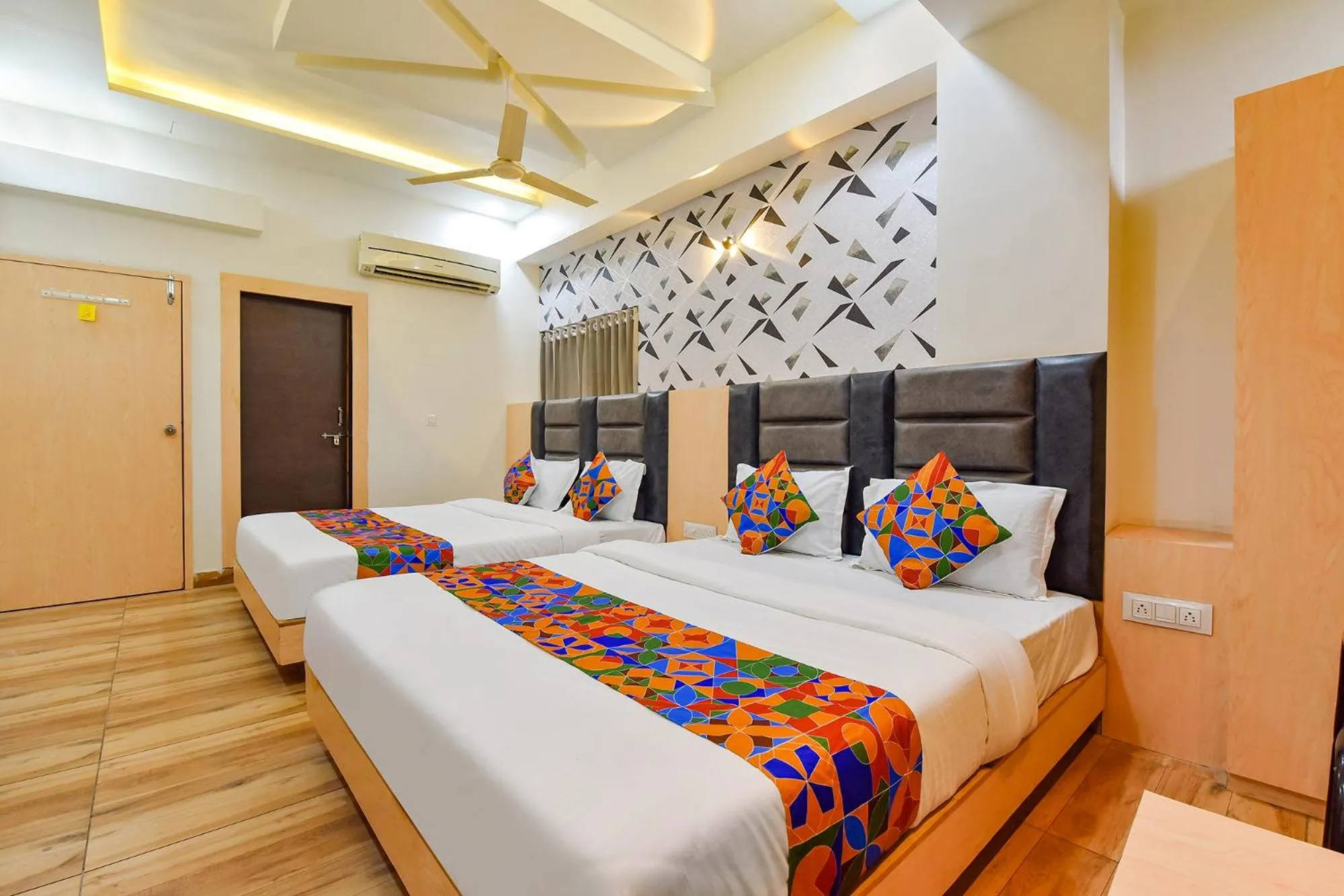 Bed in FabHotel Symphony Grand