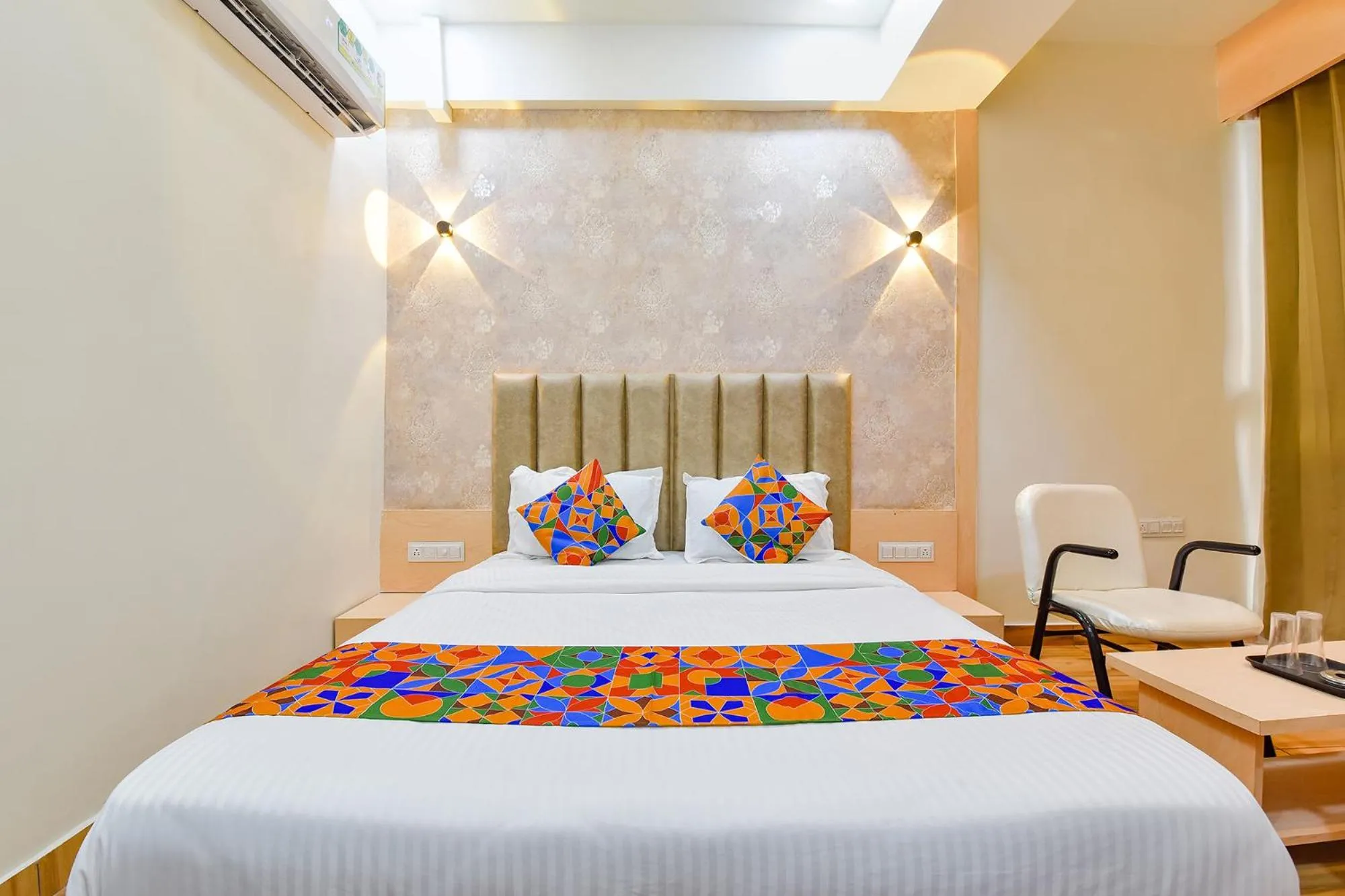 Bed in FabHotel Symphony Grand