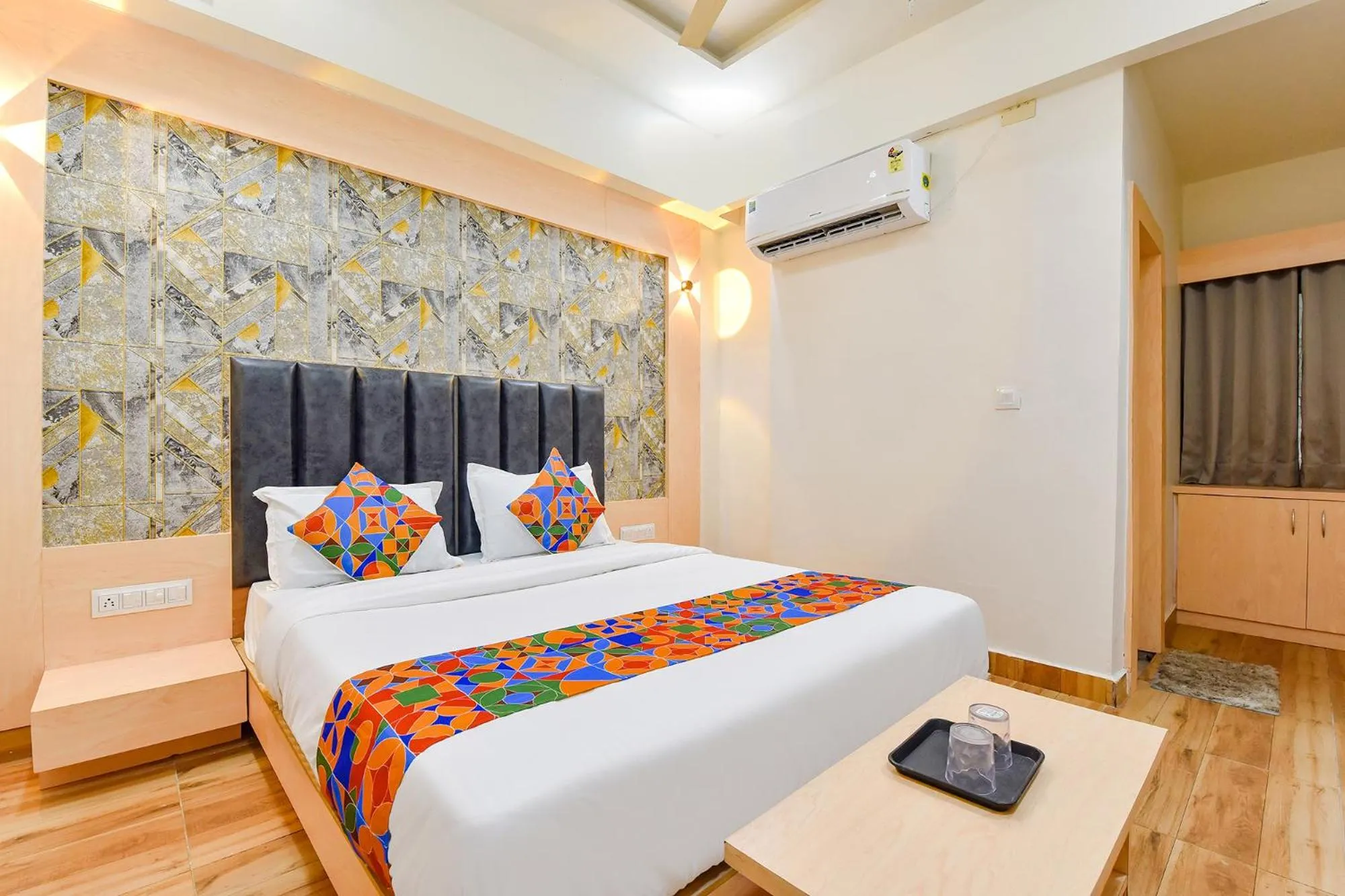 Bed in FabHotel Symphony Grand