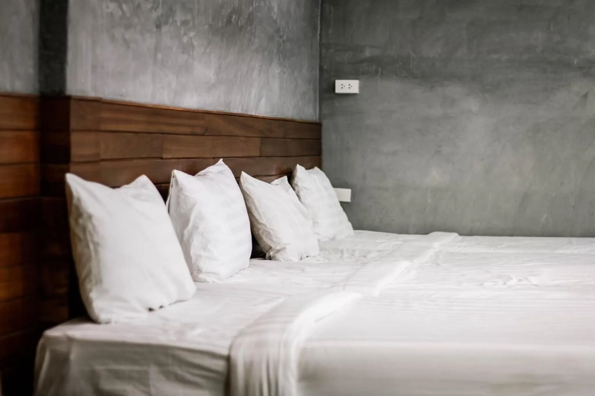 Bed in Namsai Resort Kanchanaburi