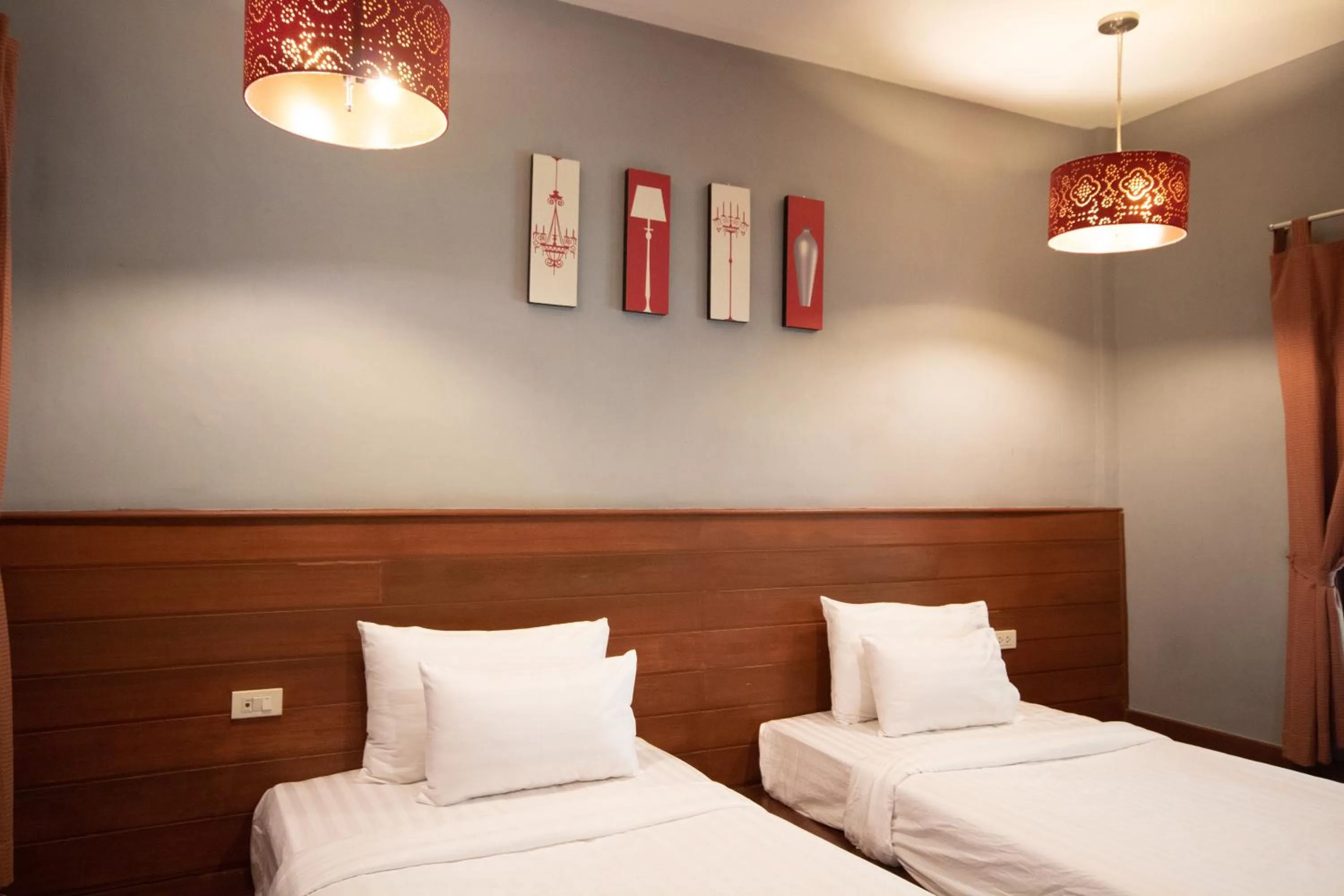 Bed in Namsai Resort Kanchanaburi