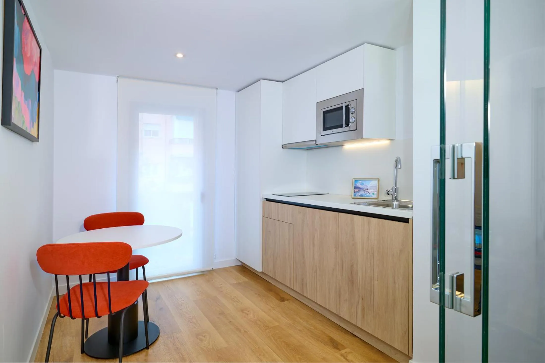 Kitchen or kitchenette in Apartamentos Luna Suites Granada