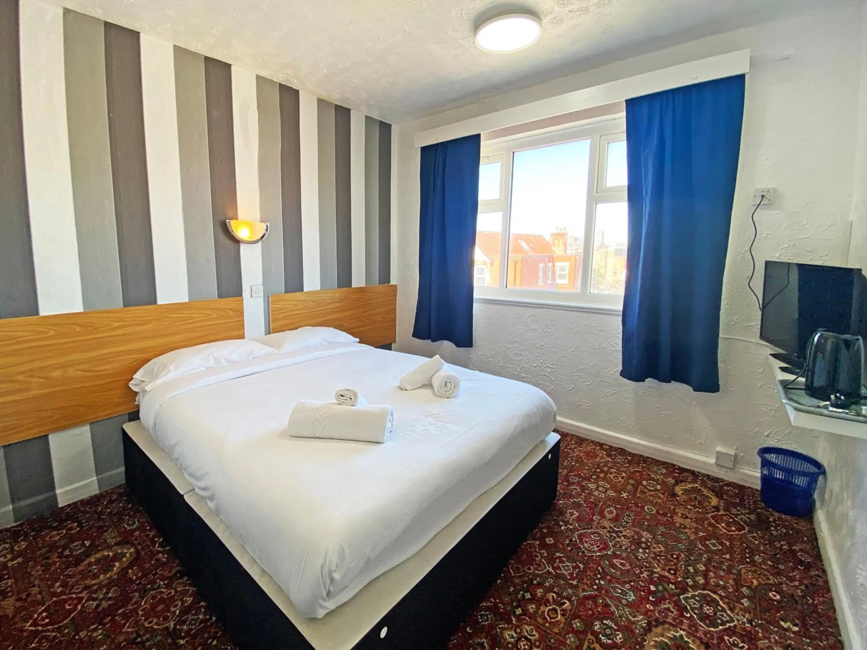 Bedroom in The J & S Hotel