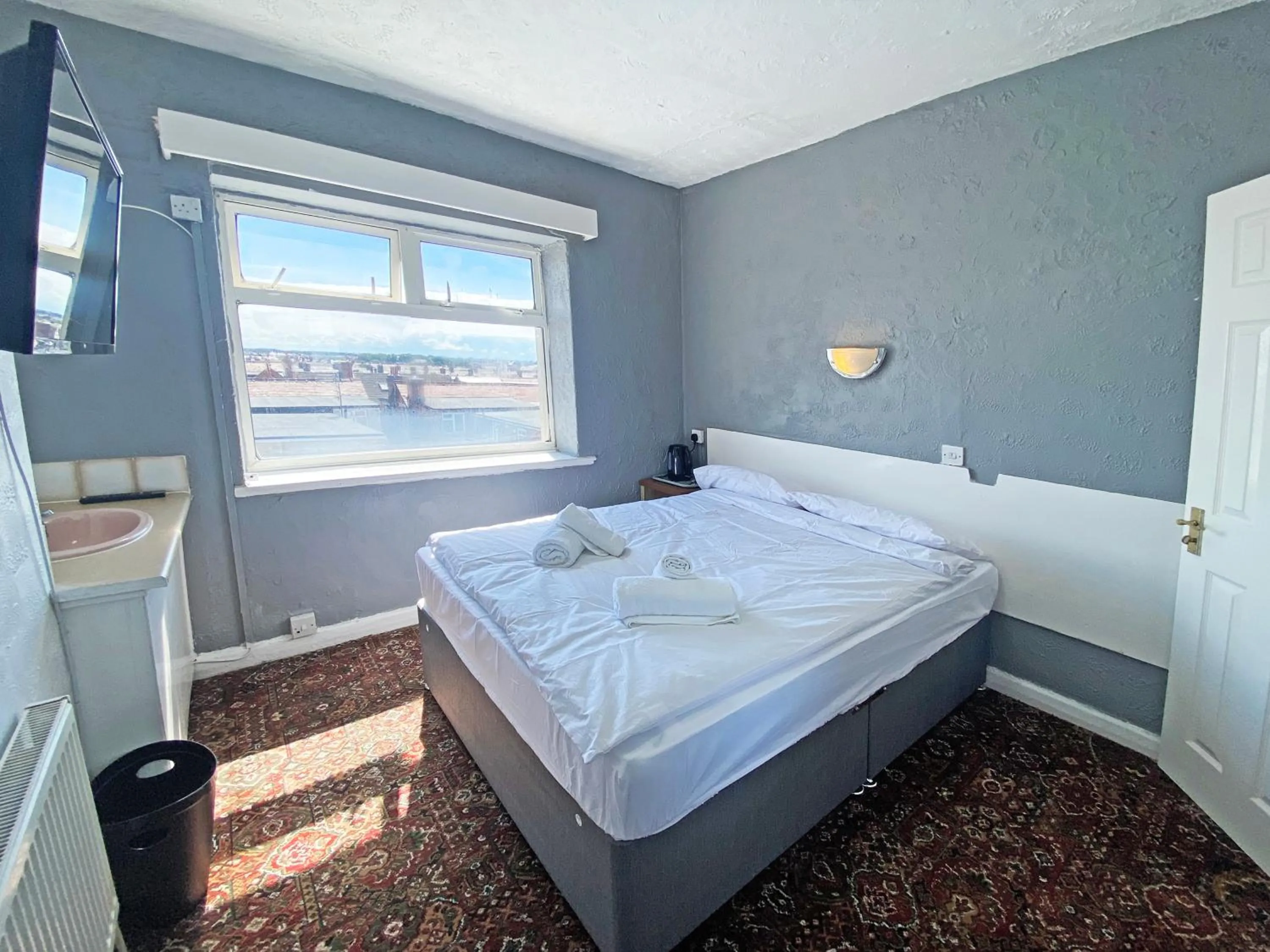 Bedroom in The J & S Hotel