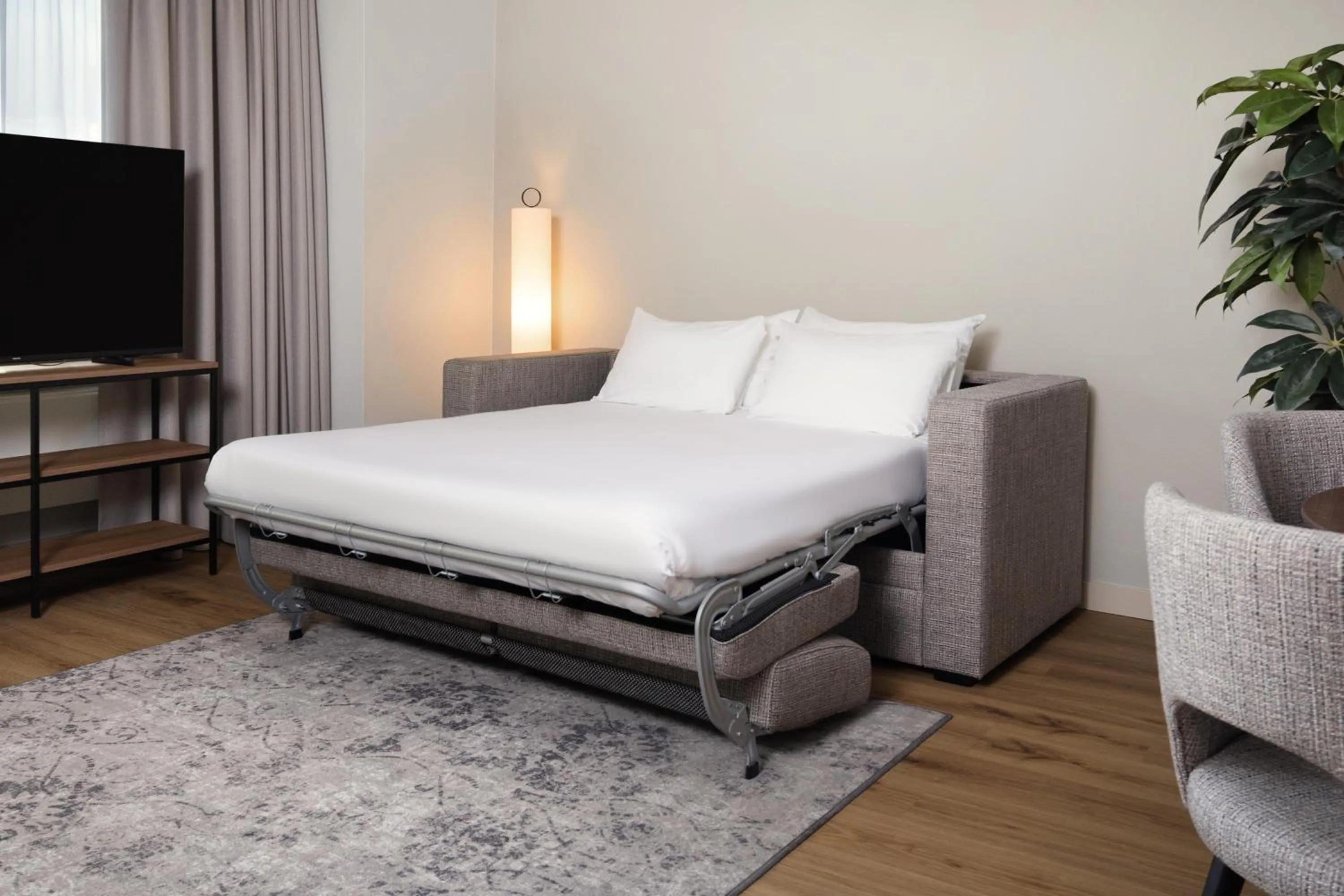 Photo of the whole room, Bed in NH Atlanta Rotterdam Hotel