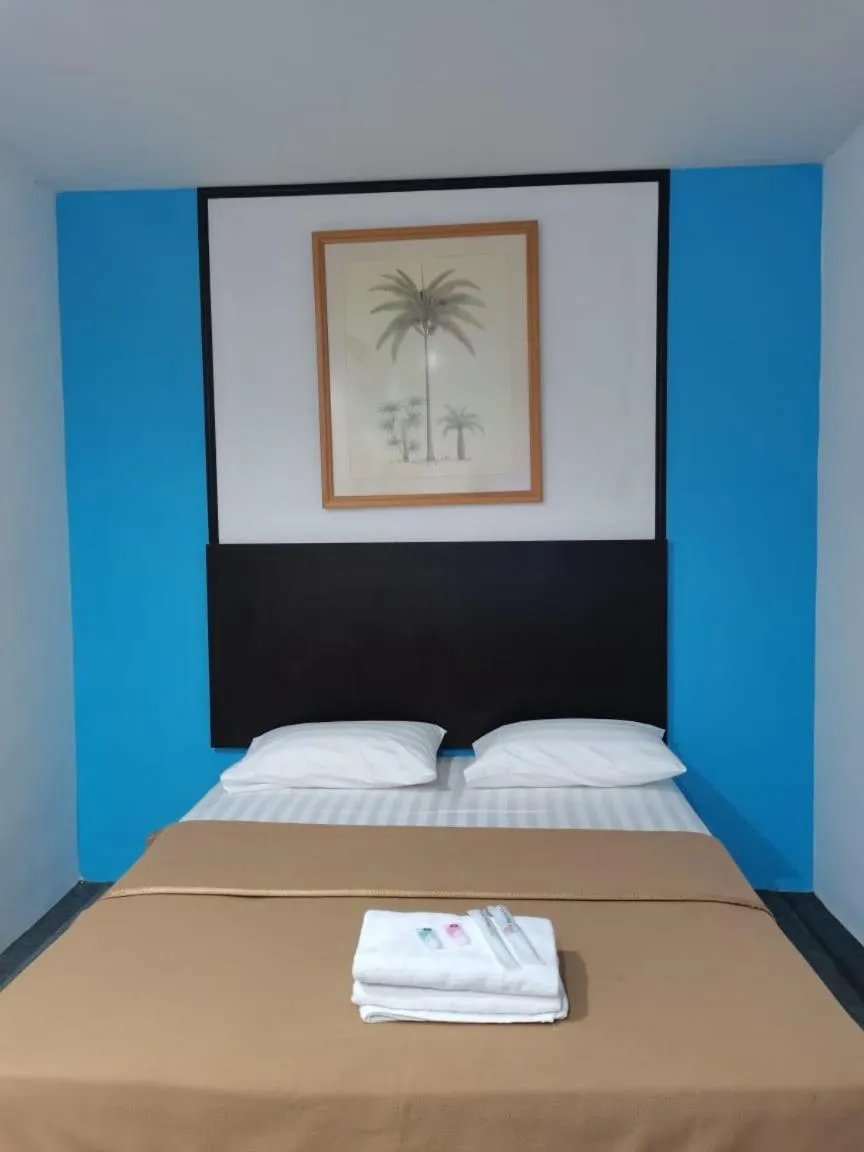 Bed in Shangg INN