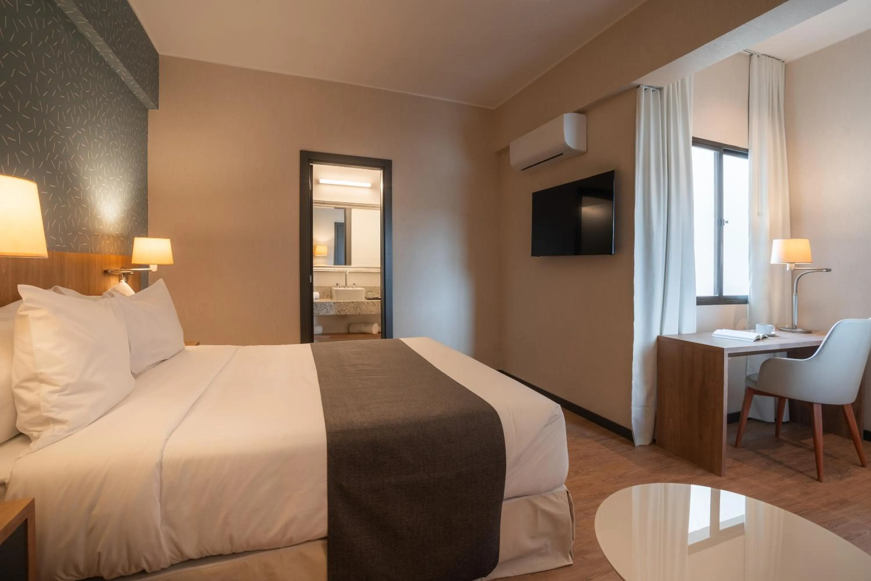 Bed in Like Design Hotel Rivera