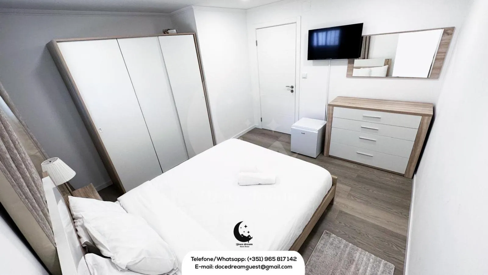 Bed in DOCE DREAM GUEST HOUSE