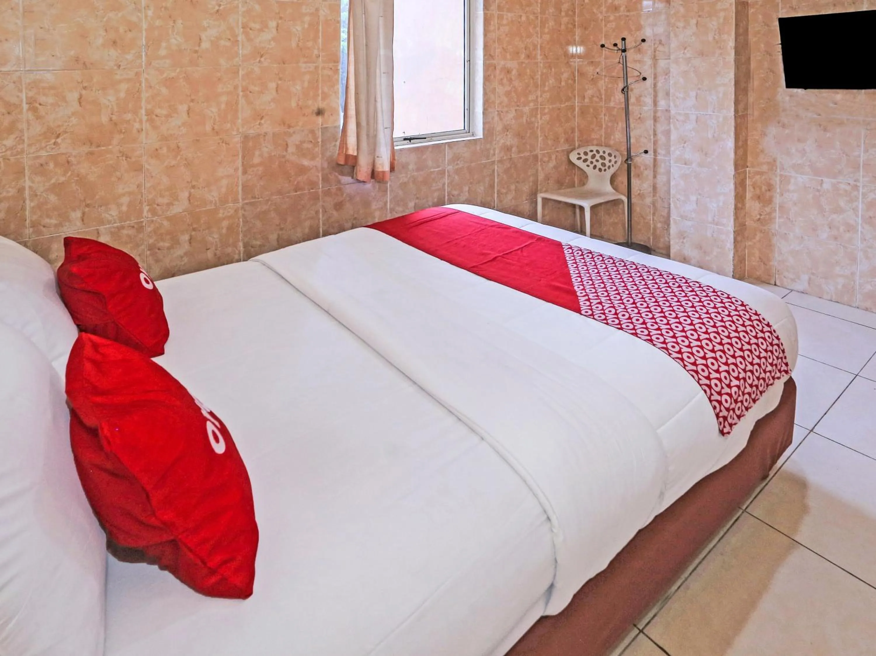 Bedroom in Hotel O Bsd